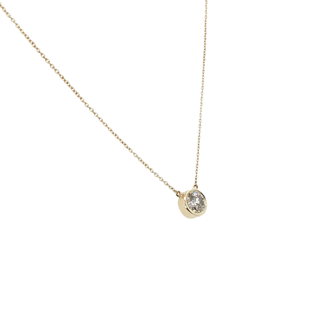 9 Carat Yellow Gold and Diamond Rim Set Pendant. 0.50 cts