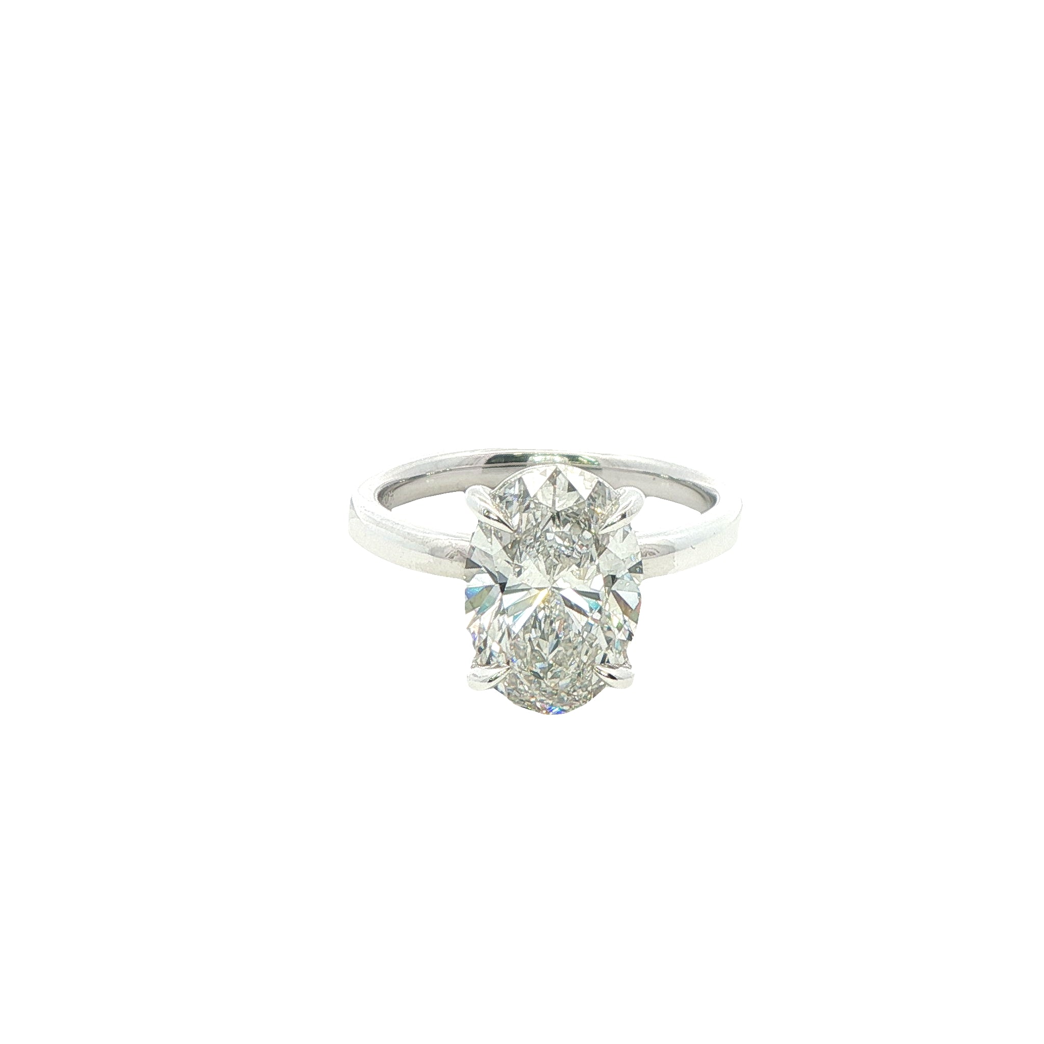 An Oval Lab Grown Diamond Ring in a silver setting. 3.08 Carats GVS1
