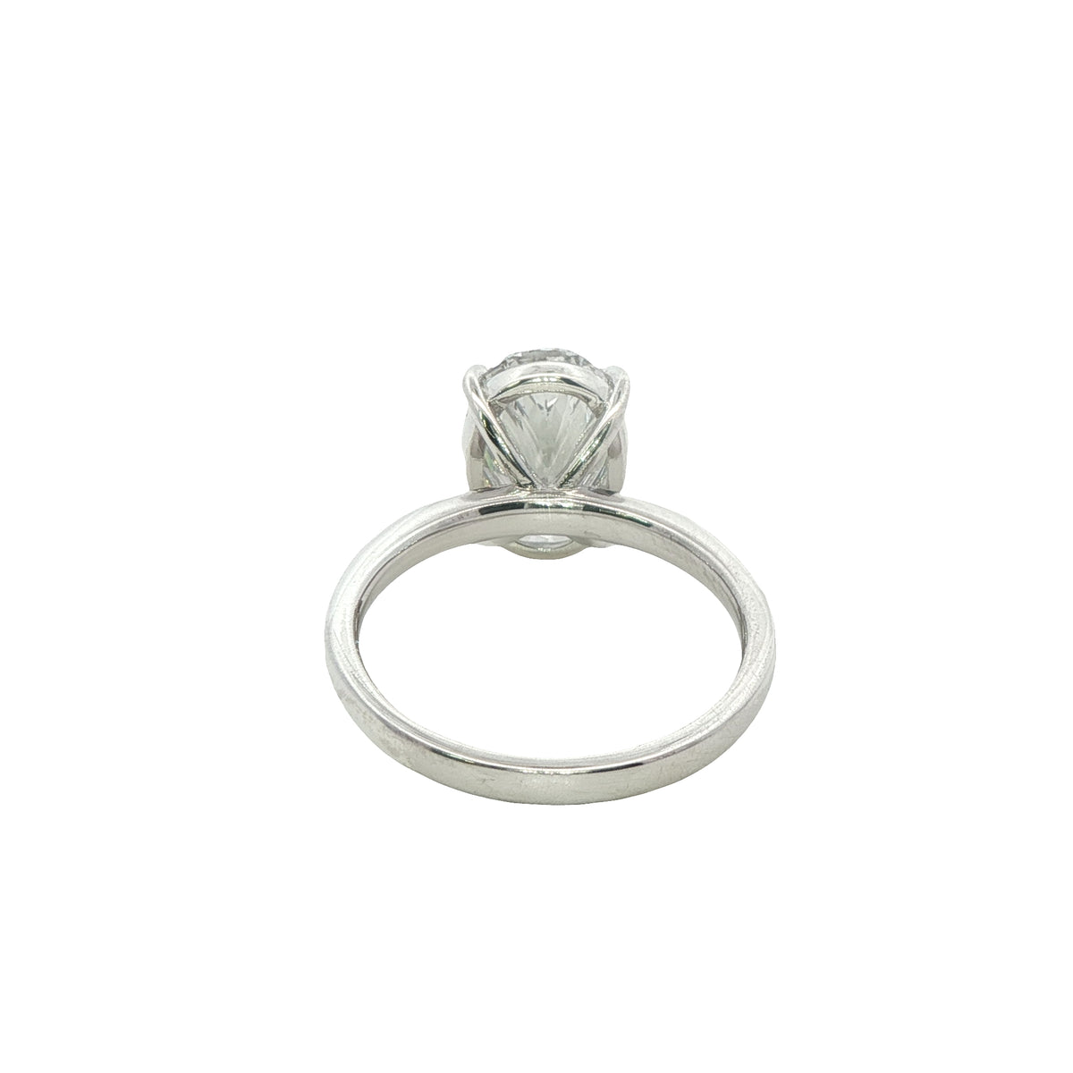 An Oval Lab Grown Diamond Ring in a silver setting. 3.08 Carats GVS1