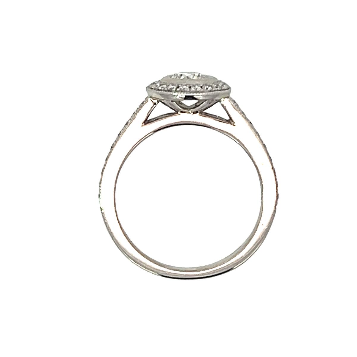A Platinum and Diamond Vintage Style Halo Ring - 0.34 F VS2