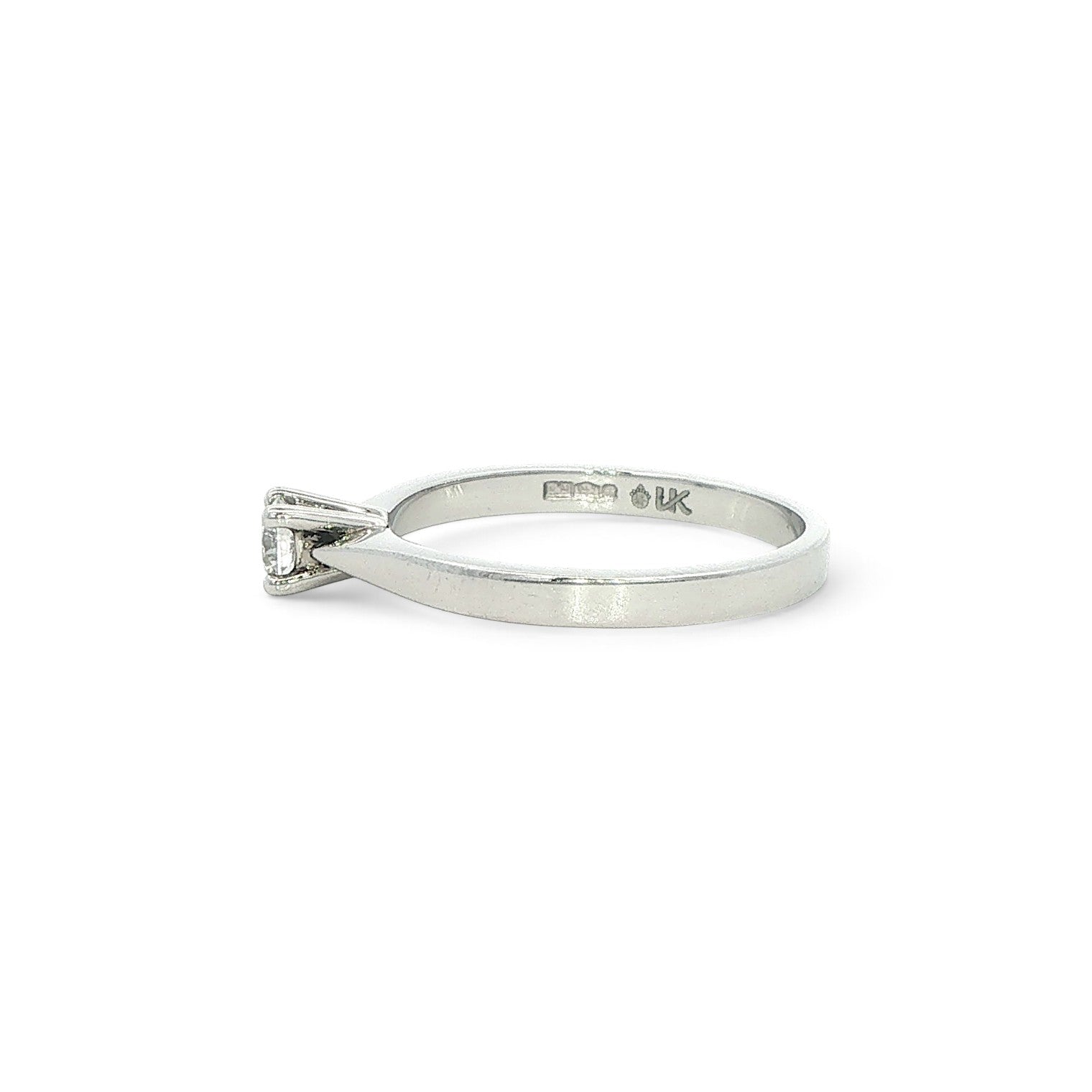 Platinum and Diamond Round Brilliant Ring - 0.18 cts F Si2