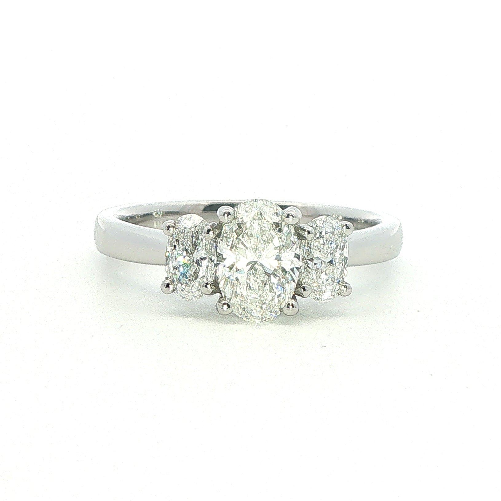 A Platinum and Oval Diamond 3 Stone Ring - 1.15 Carats