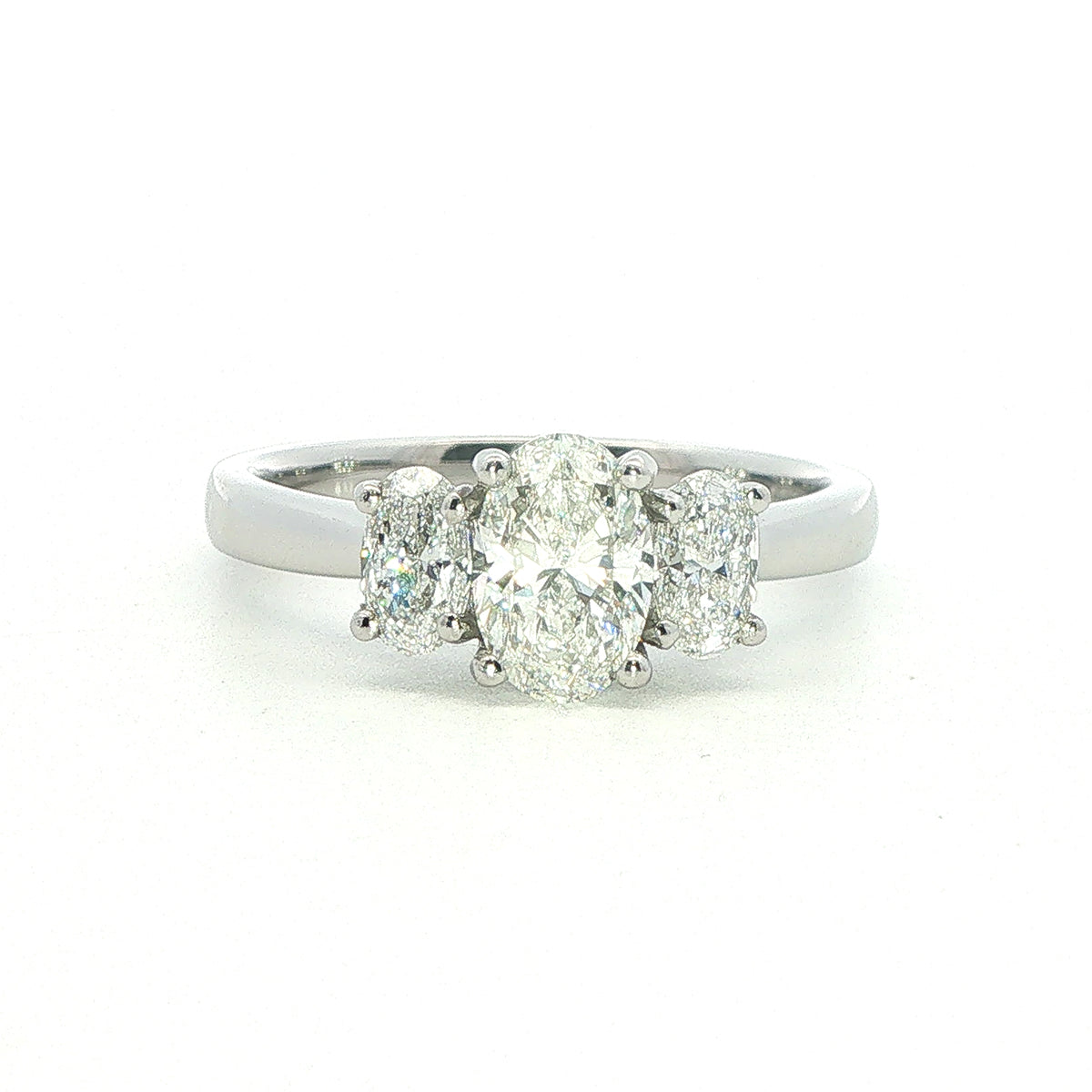 A Platinum and Oval Diamond 3 Stone Ring - 1.15 Carats