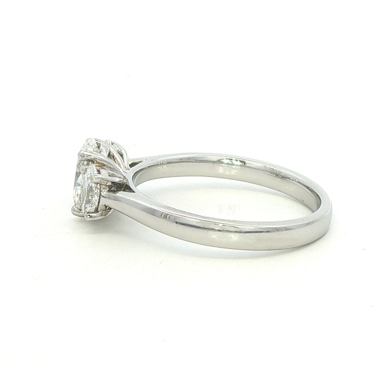 A Platinum and Oval Diamond 3 Stone Ring - 1.15 Carats
