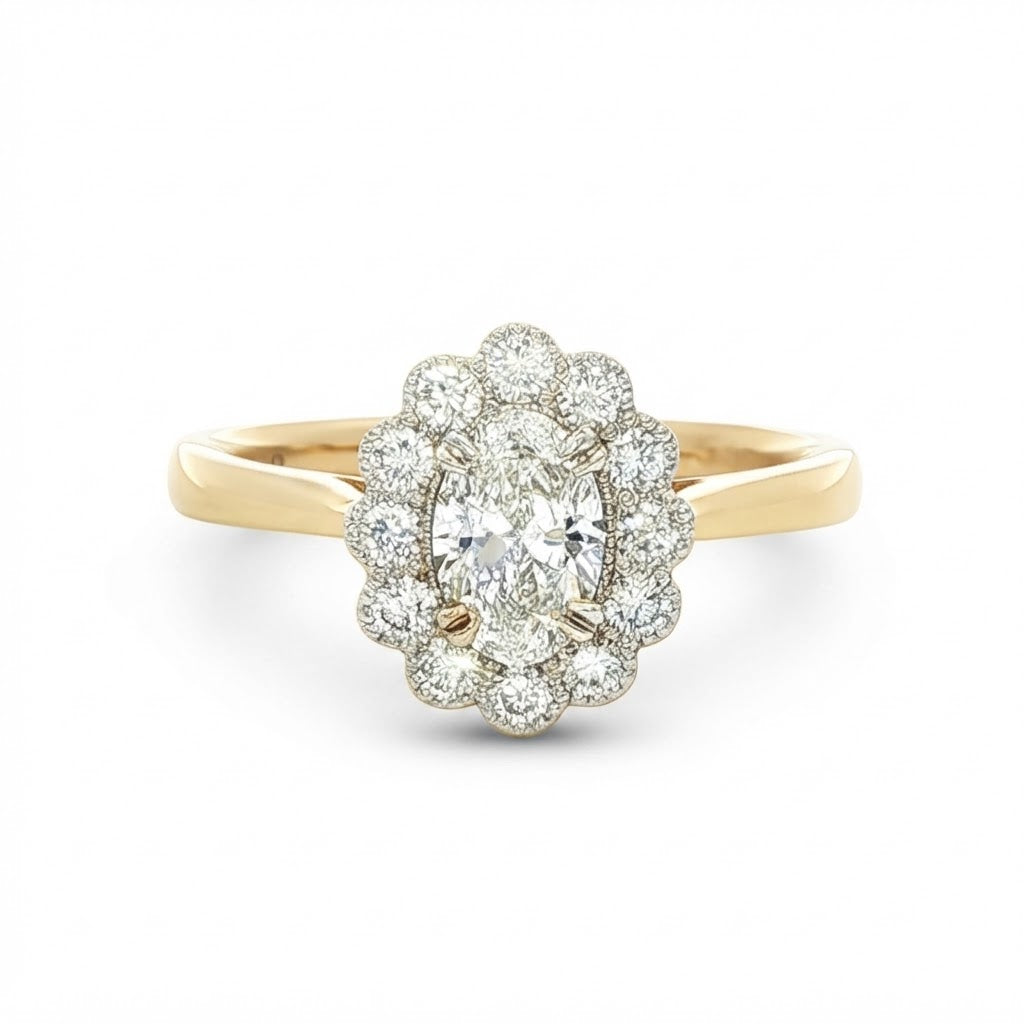 An 18 Carat Yellow and White Gold Oval Diamond Ring