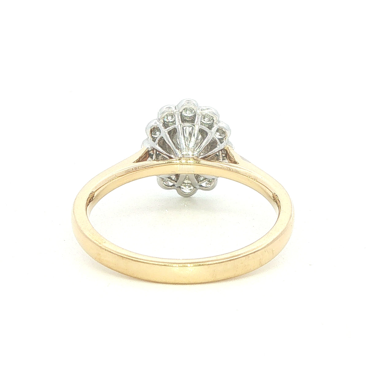 An 18 Carat Yellow and White Gold Oval Diamond Ring