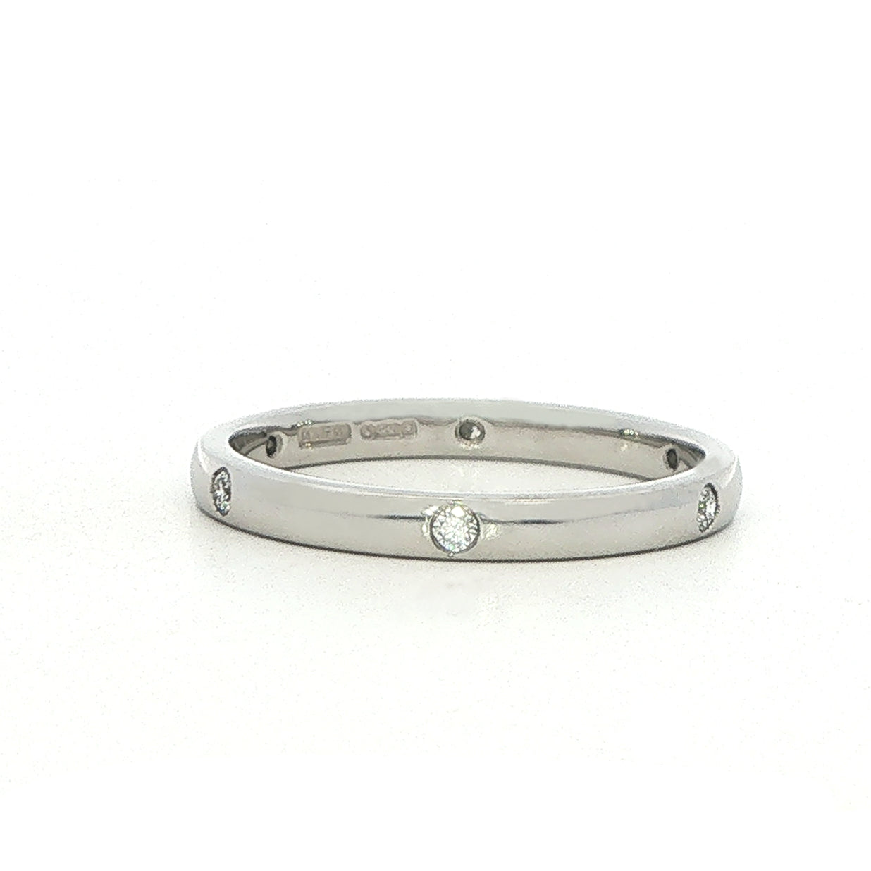 A Platinum and Diamond Flush Set Eternity Style Band