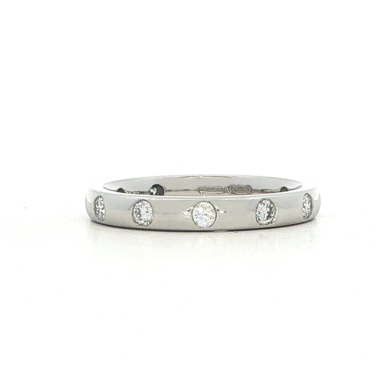 A Platinum and Diamond Flush Set Eternity Style Band - 0.60 Cts