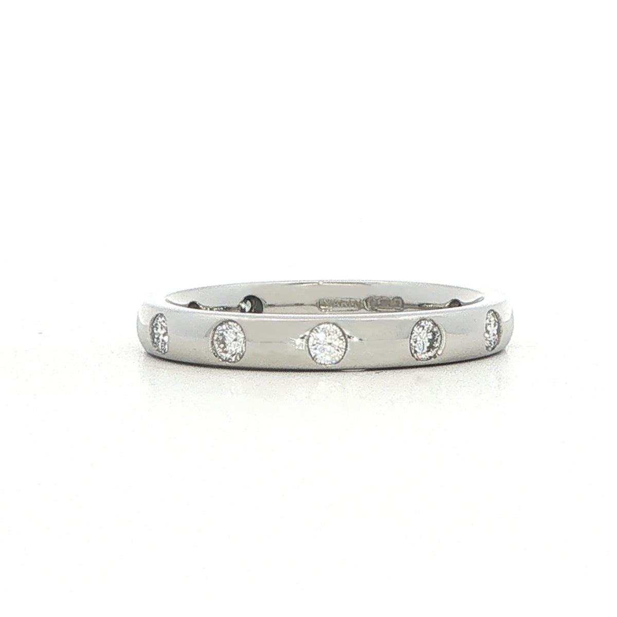 A Platinum and Diamond Flush Set Eternity Style Band - 0.60 Cts
