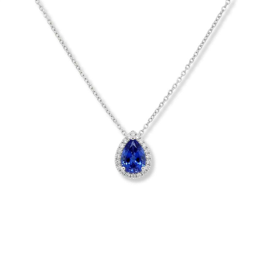 An 18ct White Gold Pear Shape Tanzanite and Diamond Pendant