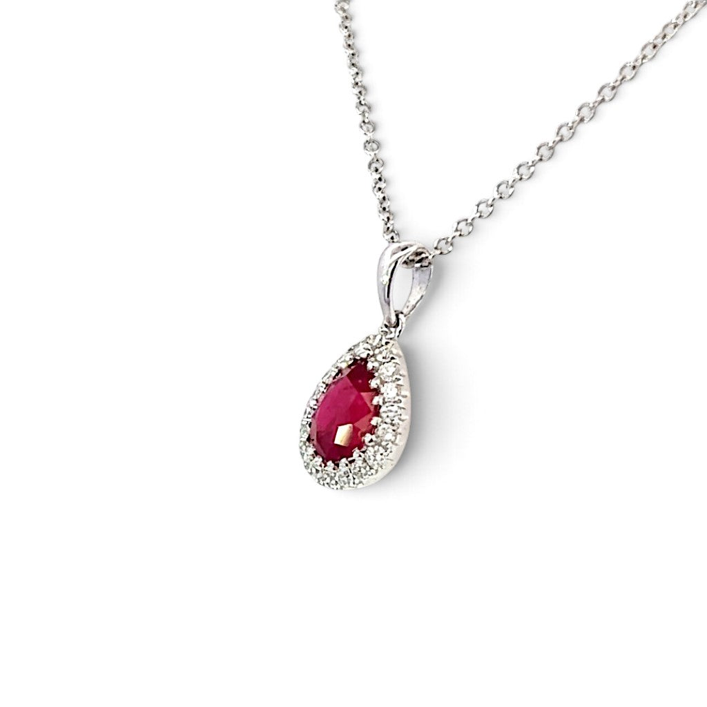 An 18 Carat White Gold Ruby and Diamond Halo Pendant