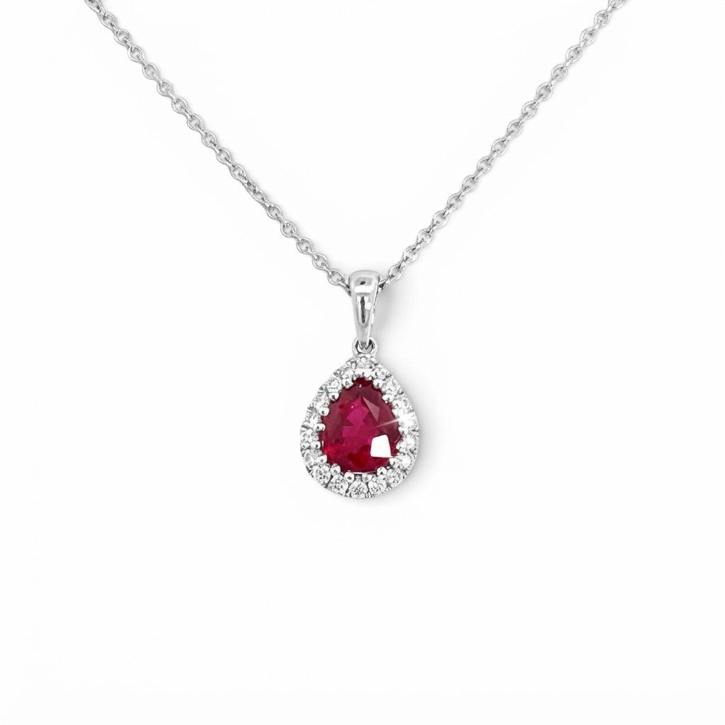 An 18 Carat White Gold Ruby and Diamond Halo Pendant