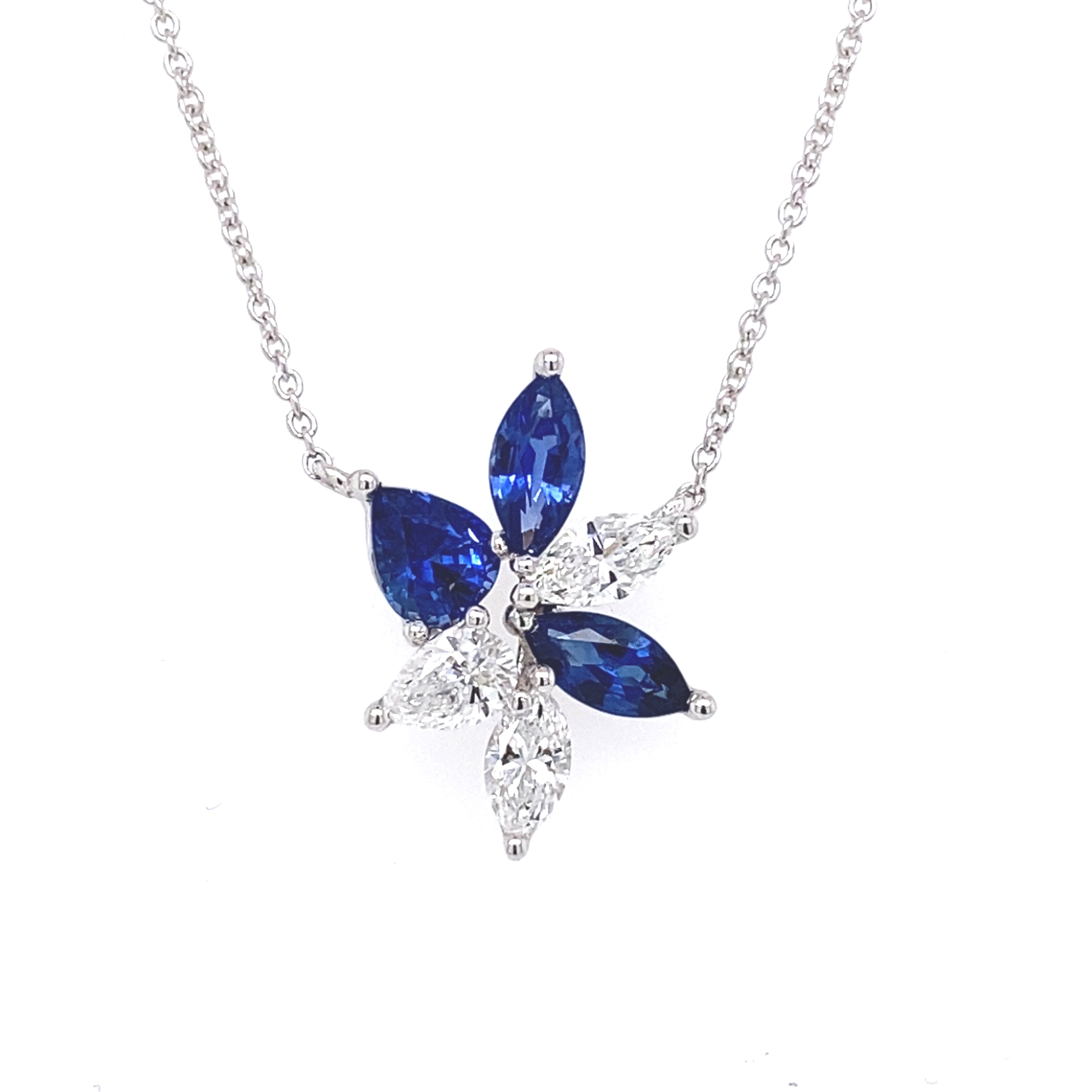 An 18 Carat Sapphire and Diamond Floral Pendant