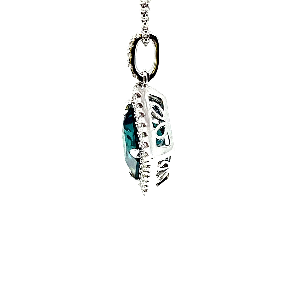 An 18 Carat White Gold Tourmaline and Diamond Halo Pendant