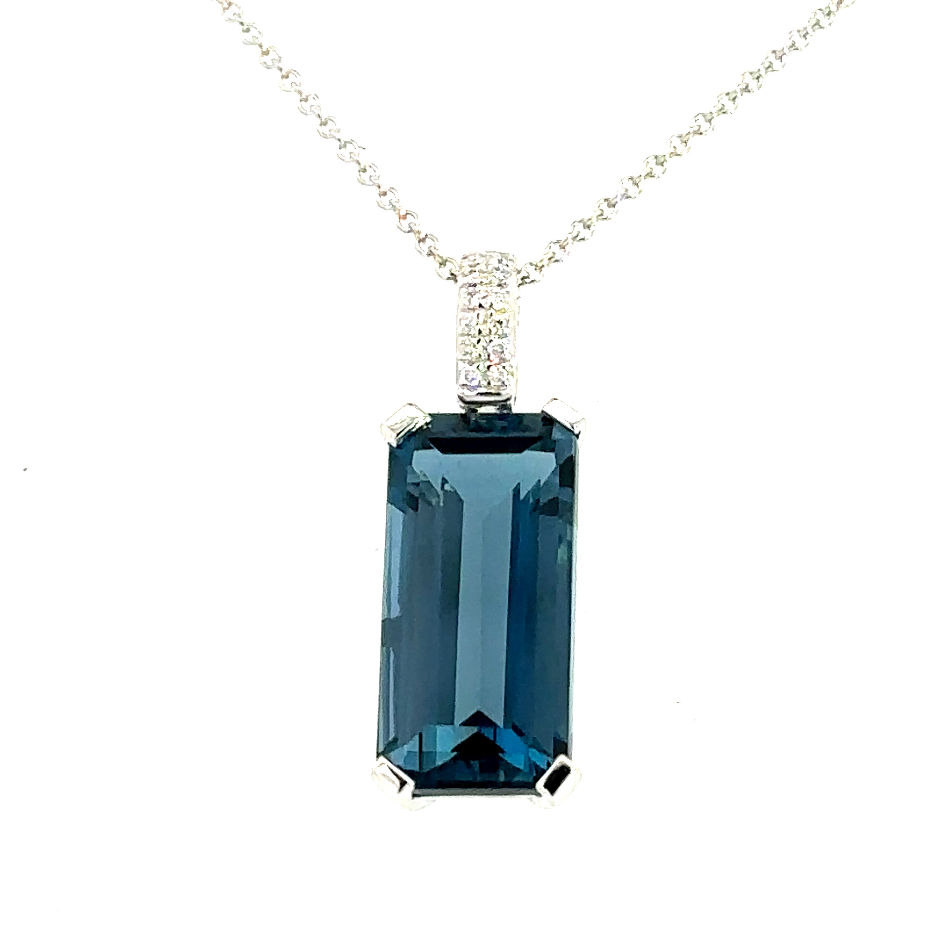 A 9 Carat White Gold  London Blue Topaz and Diamond Pendant