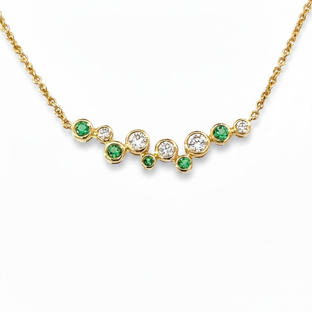 An 18 Carat Yellow Gold Emerald and Diamond Bubbles Smile Necklet