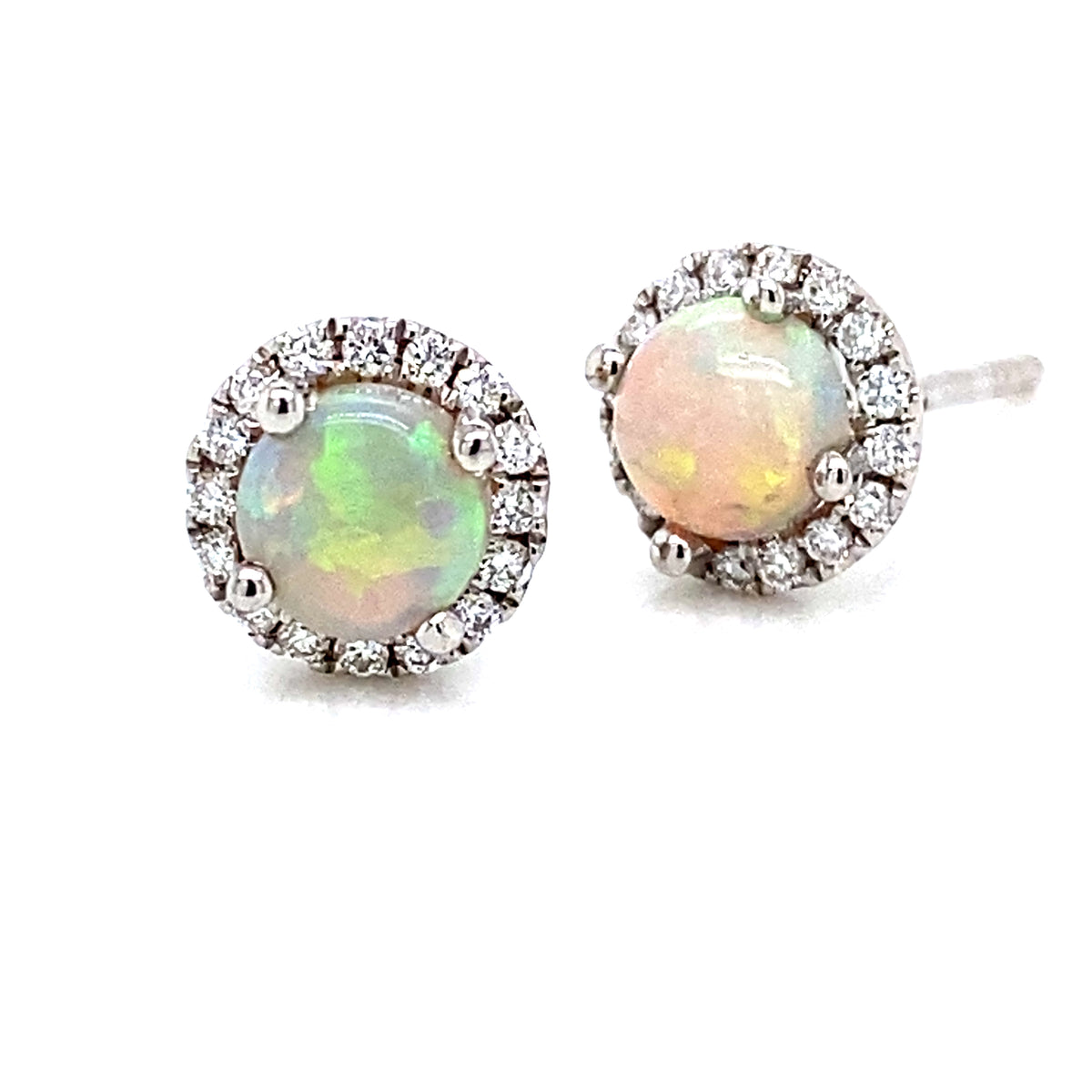 A Pair of 18 Carat White Gold Opal And Diamond Halo Studs