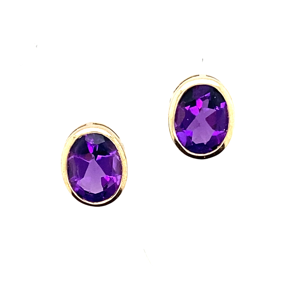 A Pair of 9 Carat Yellow Gold Oval Amethyst Studs