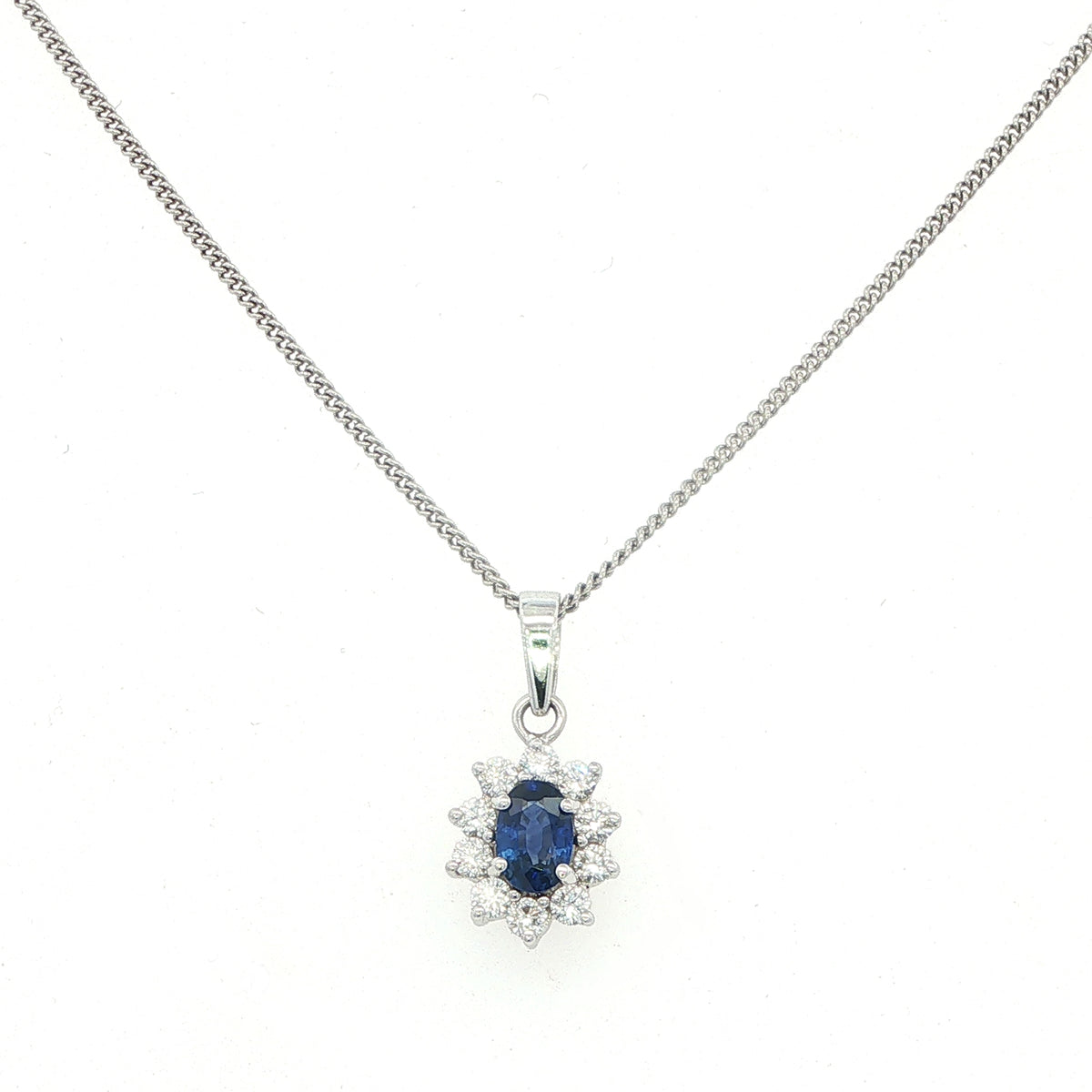An 18 Carat White Gold Sapphire and Diamond Pendant