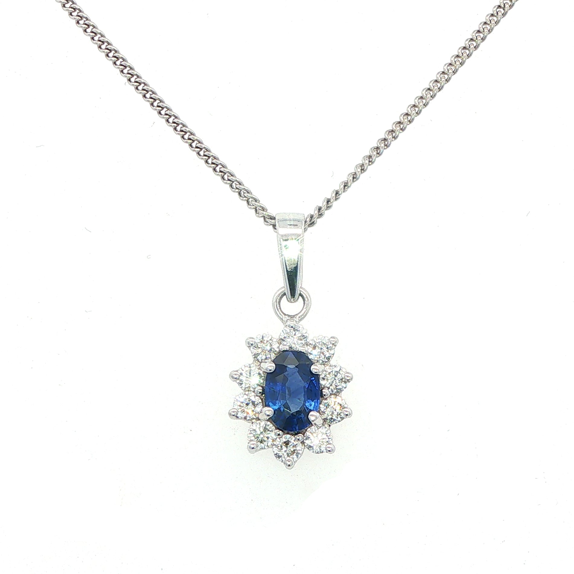 An 18 Carat White Gold Sapphire and Diamond Pendant
