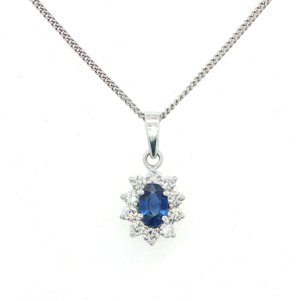 An 18 Carat White Gold Sapphire and Diamond Pendant