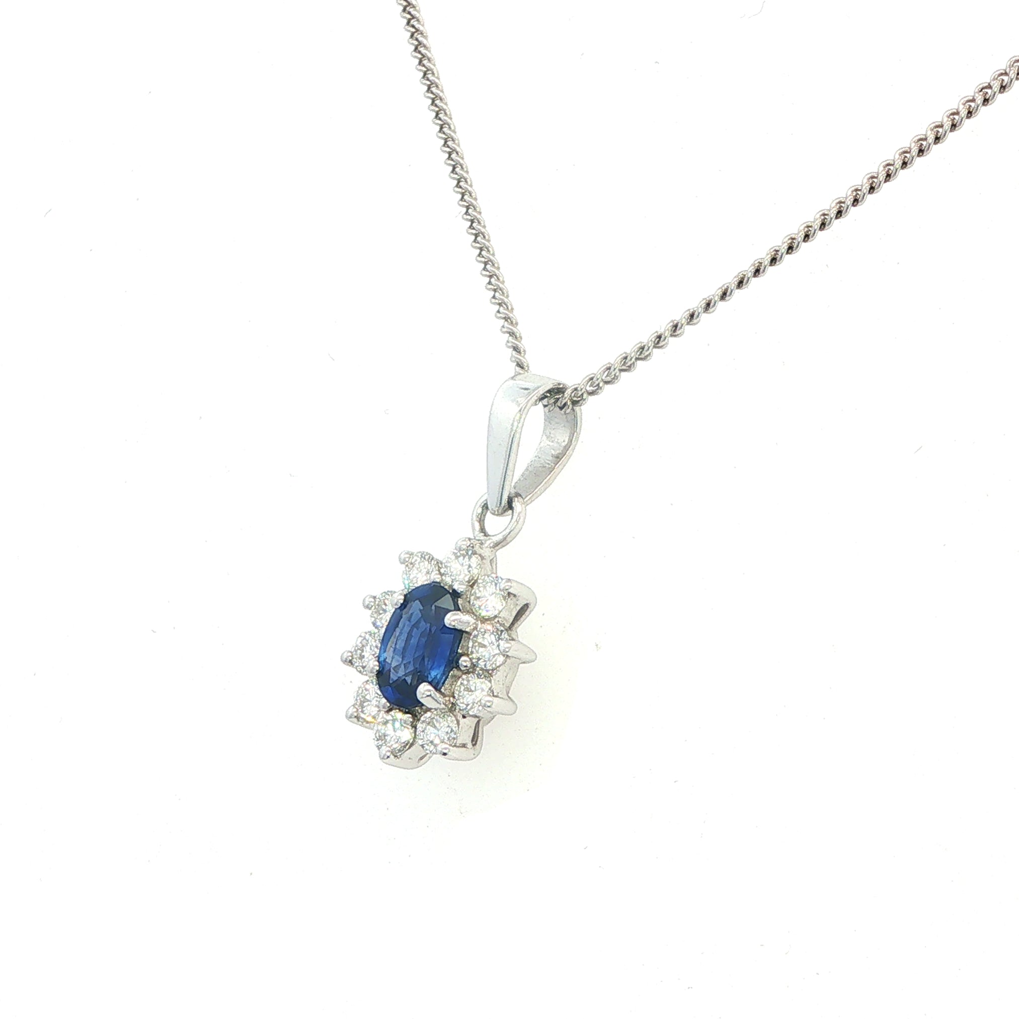 An 18 Carat White Gold Sapphire and Diamond Pendant