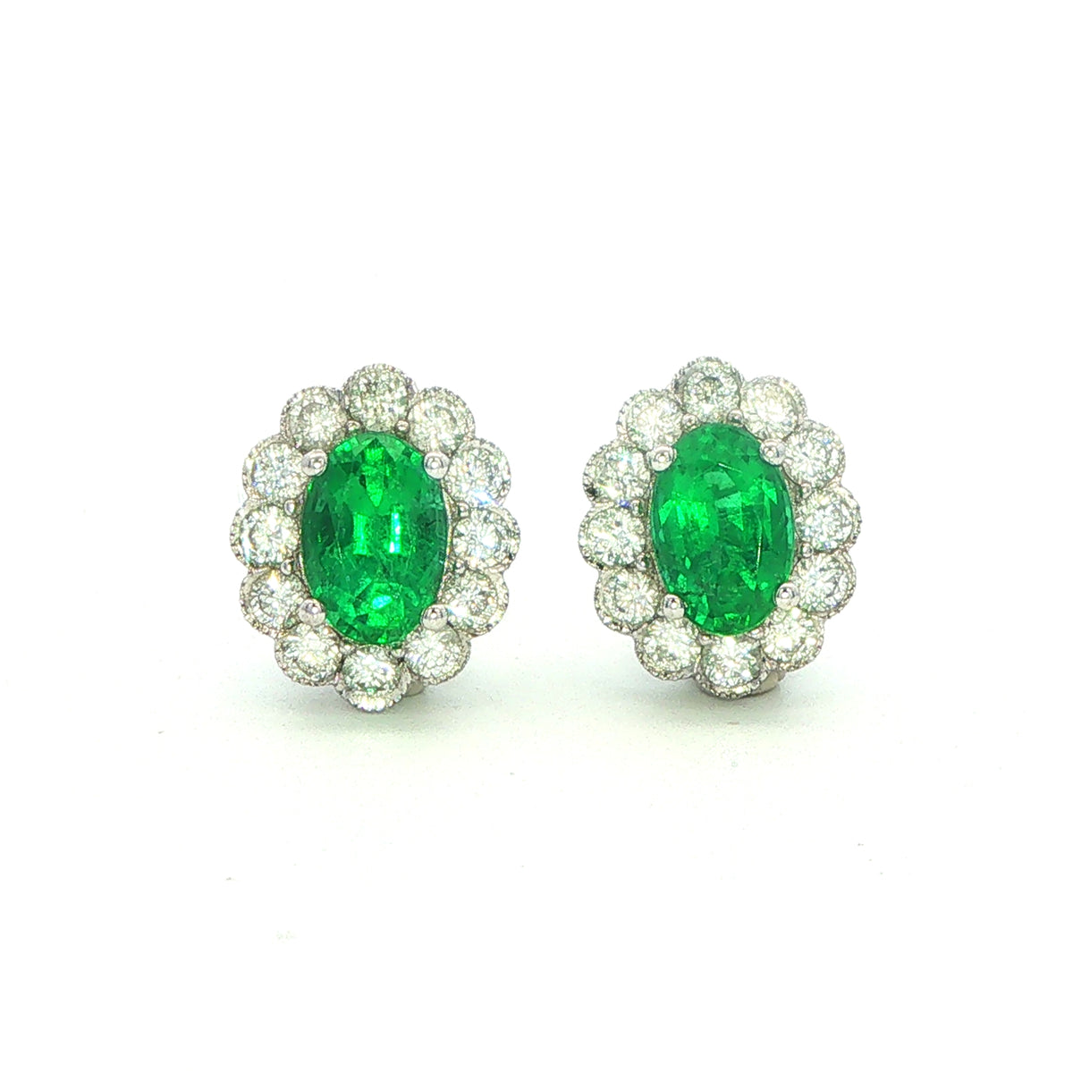 18 White Gold Diamond and Emerald Stud Earrings