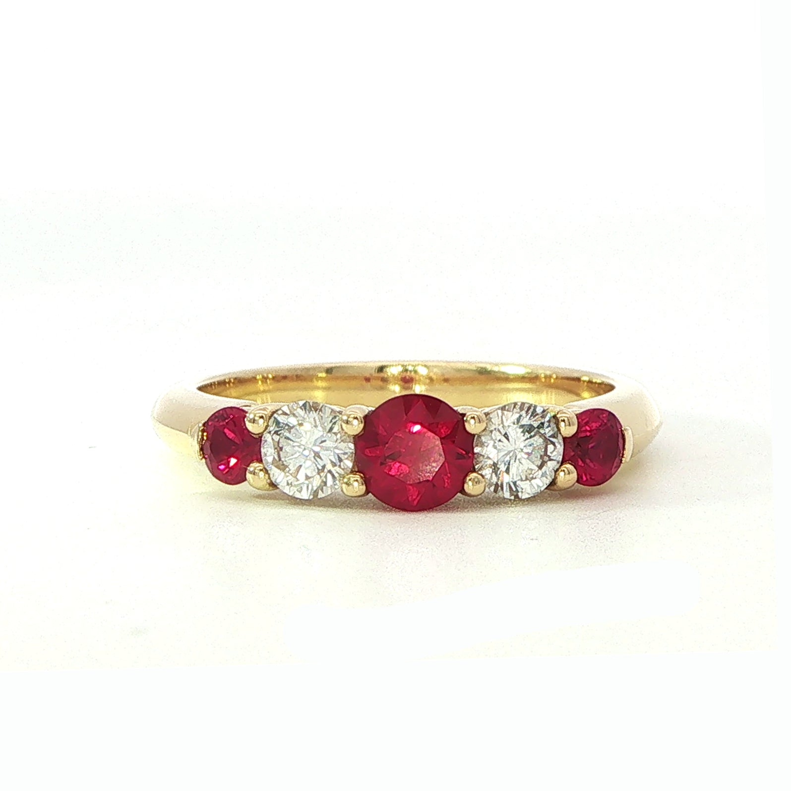 An 18 Carat Yellow Gold Five Stone Ruby and Diamond Ring