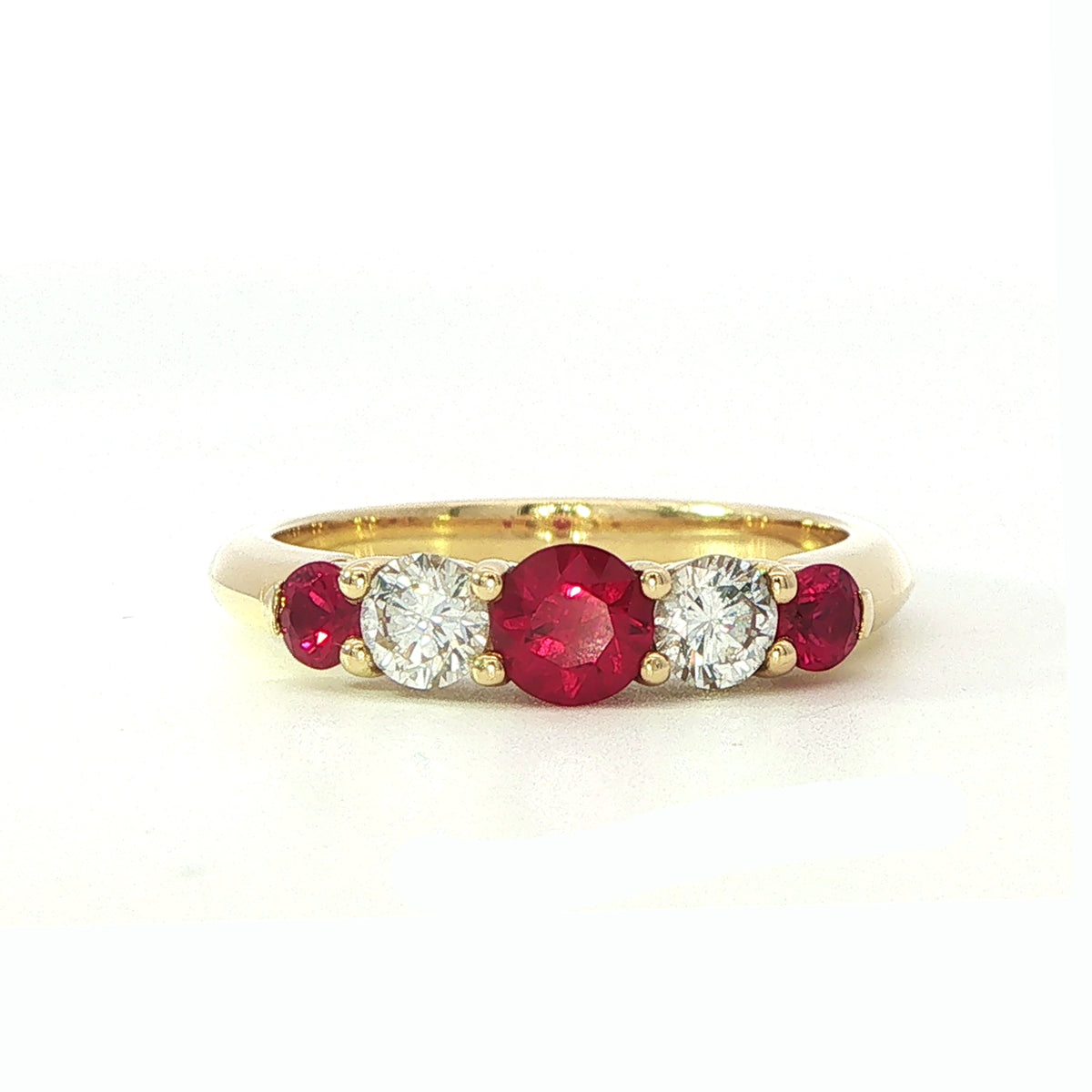 An 18 Carat Yellow Gold Five Stone Ruby and Diamond Ring