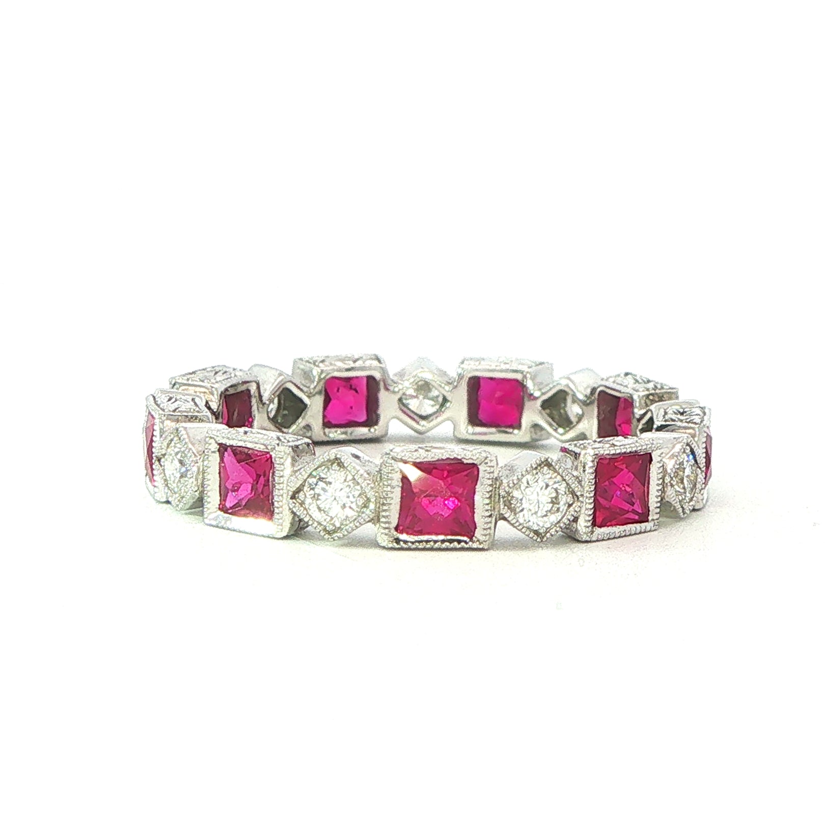 An 18 Carat White Gold Ruby and Diamond Full Eternity Ring