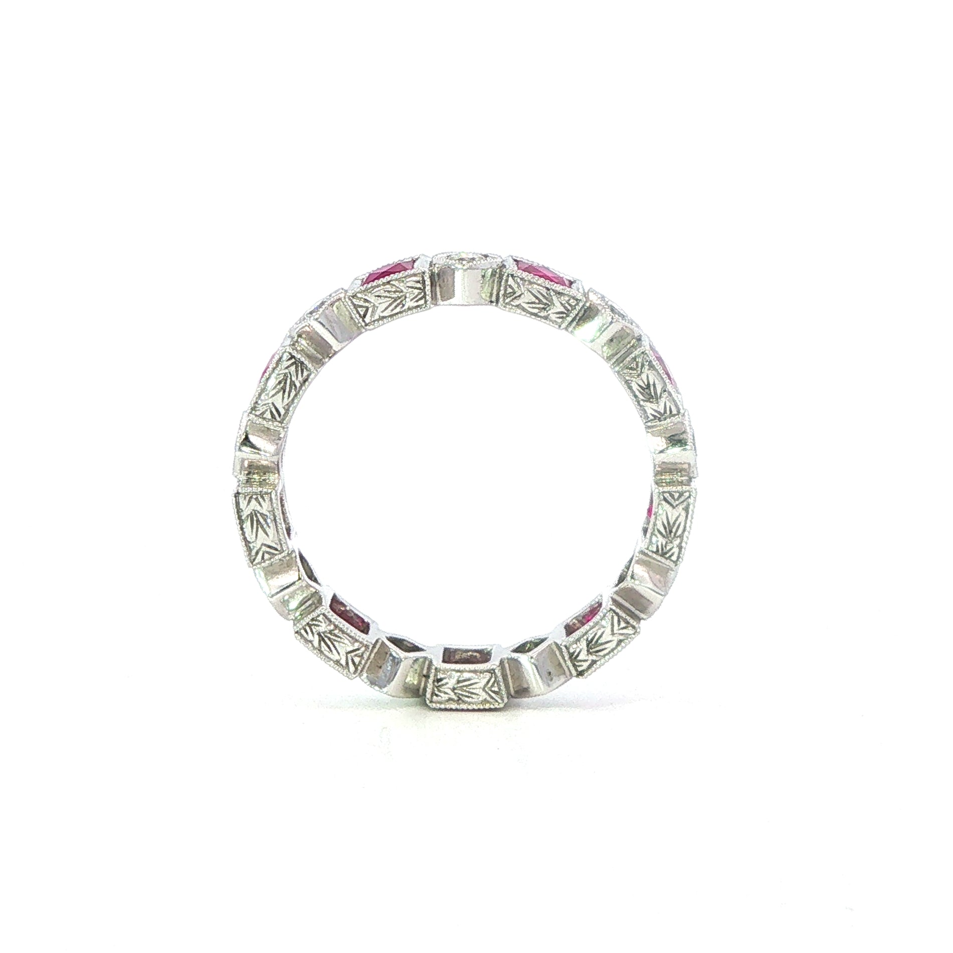 An 18 Carat White Gold Ruby and Diamond Full Eternity Ring