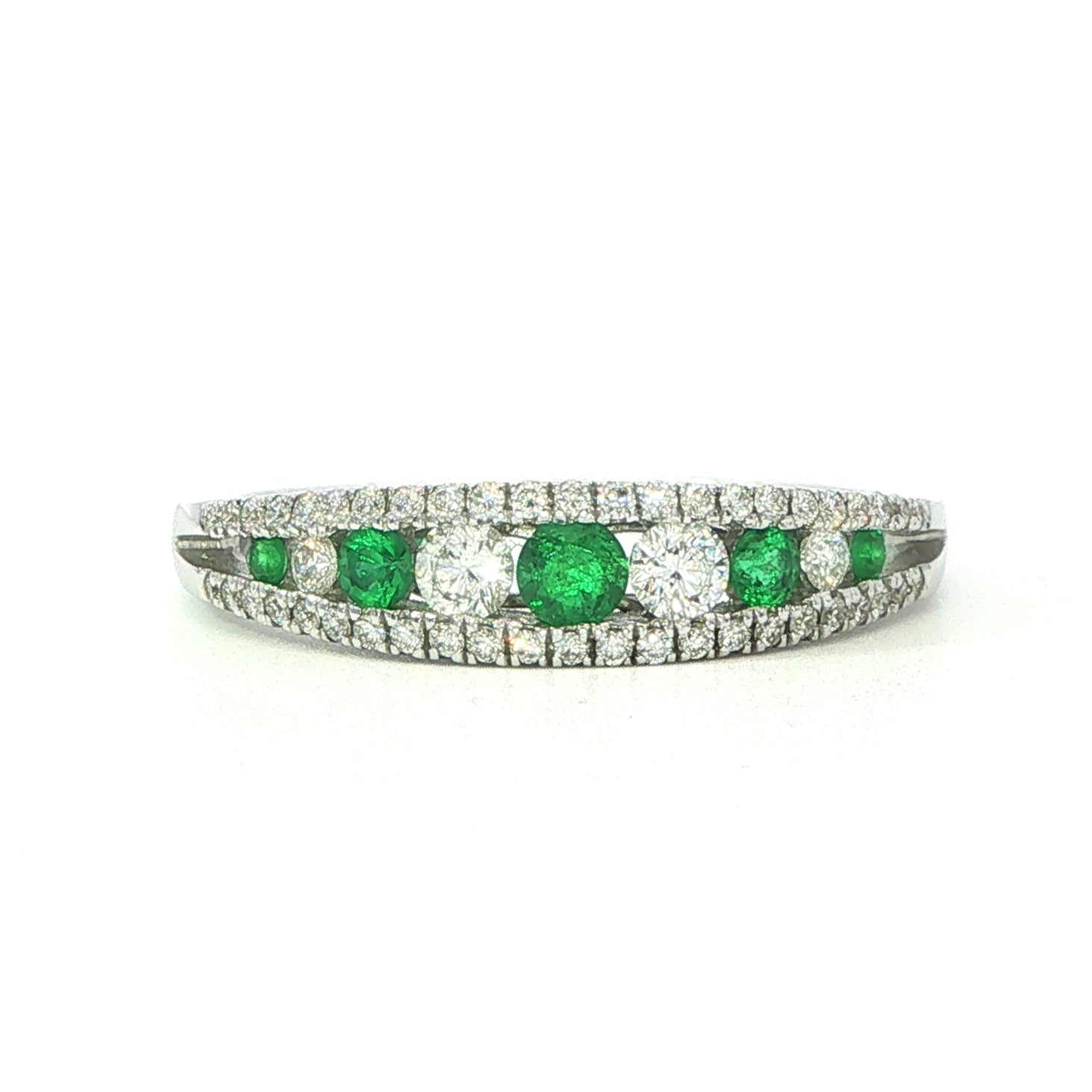An 18 Carat White Gold Emerald and Diamond Ring