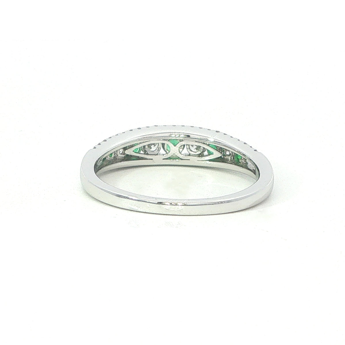An 18 Carat White Gold Emerald and Diamond Ring