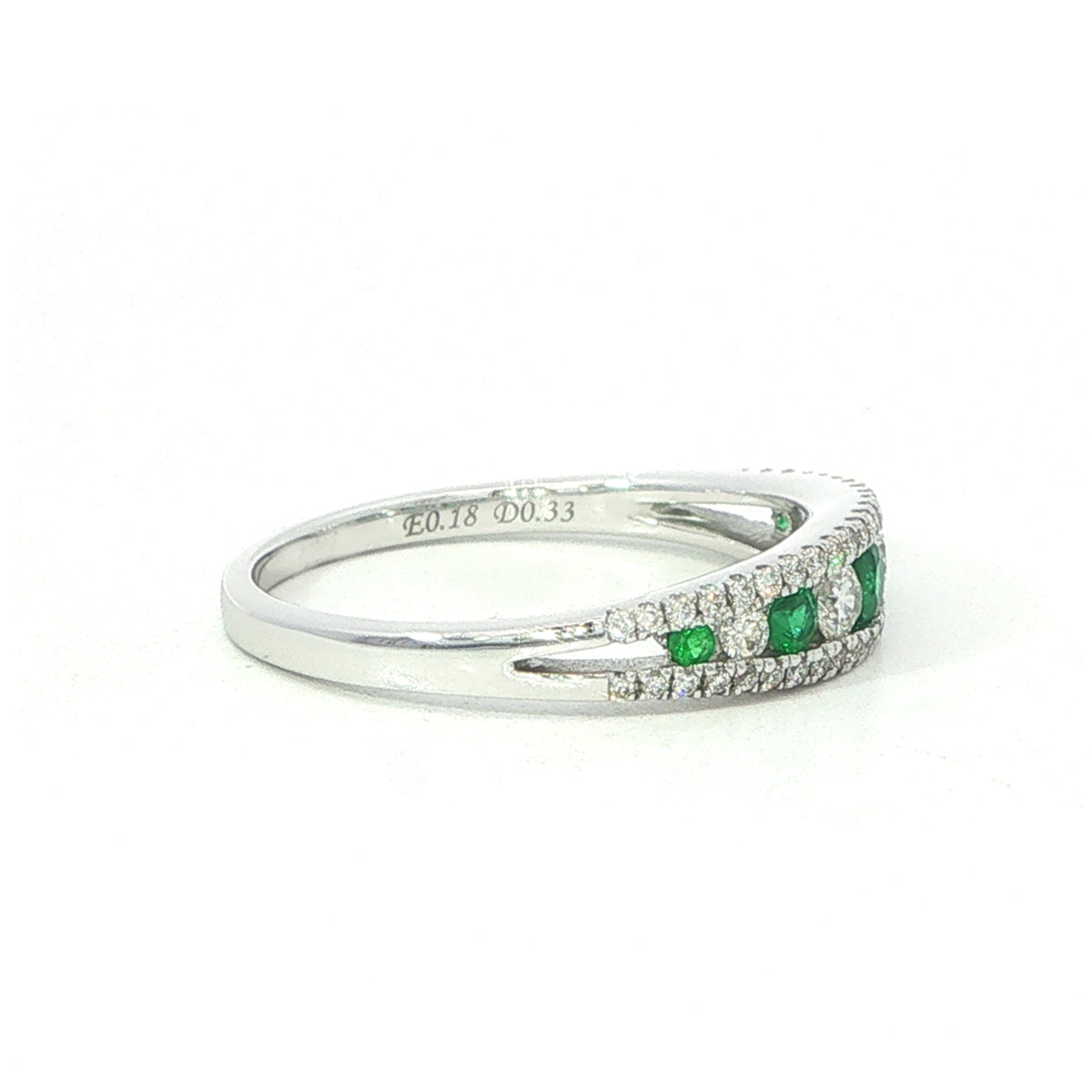 An 18 Carat White Gold Emerald and Diamond Ring