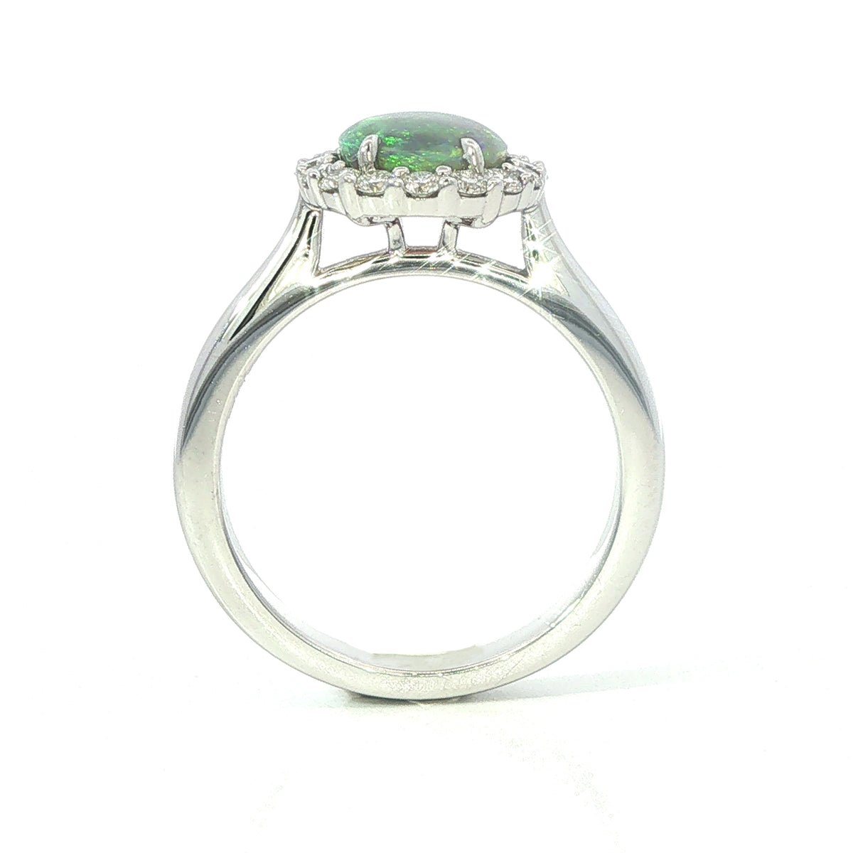 An 18 Carat White Gold Black Opal and Diamond Halo Ring