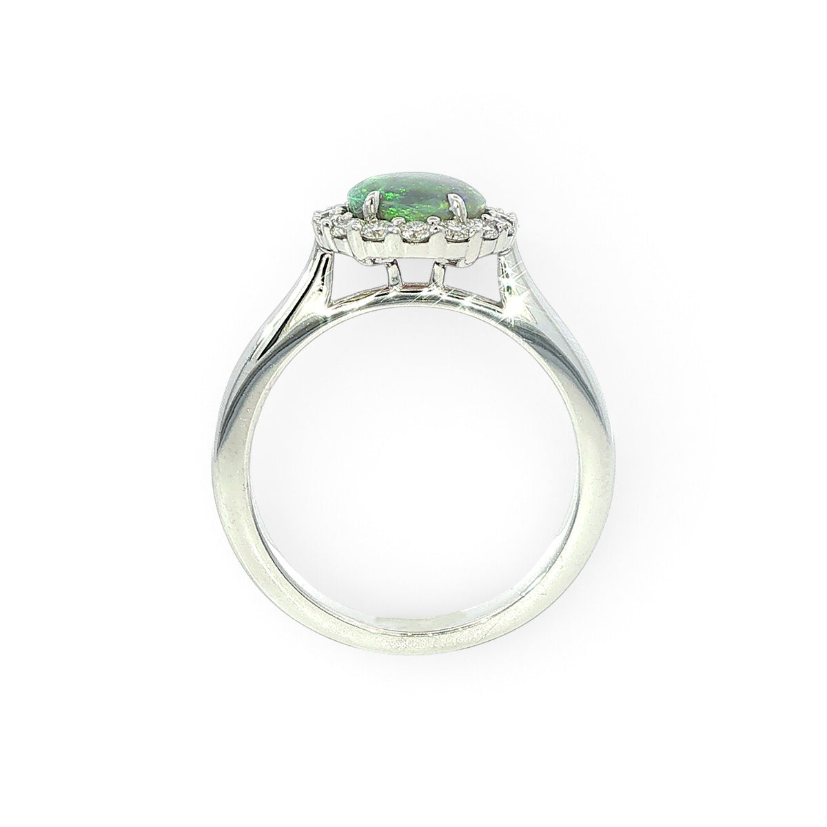 An 18 Carat White Gold Black Opal and Diamond Halo Ring
