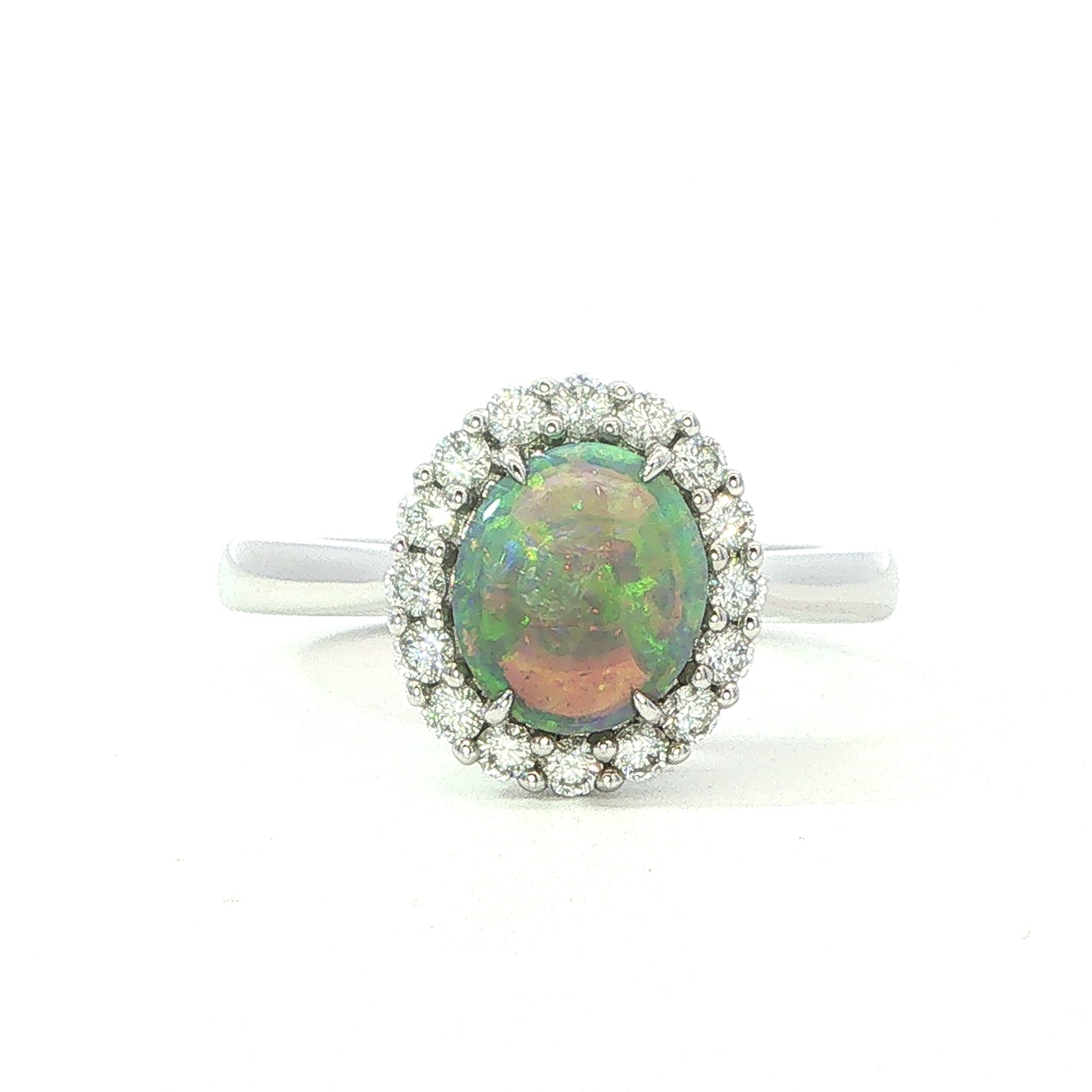 An 18 Carat White Gold Black Opal and Diamond Halo Ring