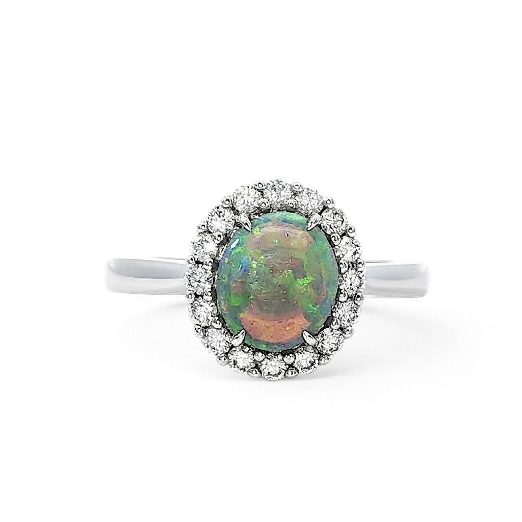 An 18 Carat White Gold Black Opal and Diamond Halo Ring