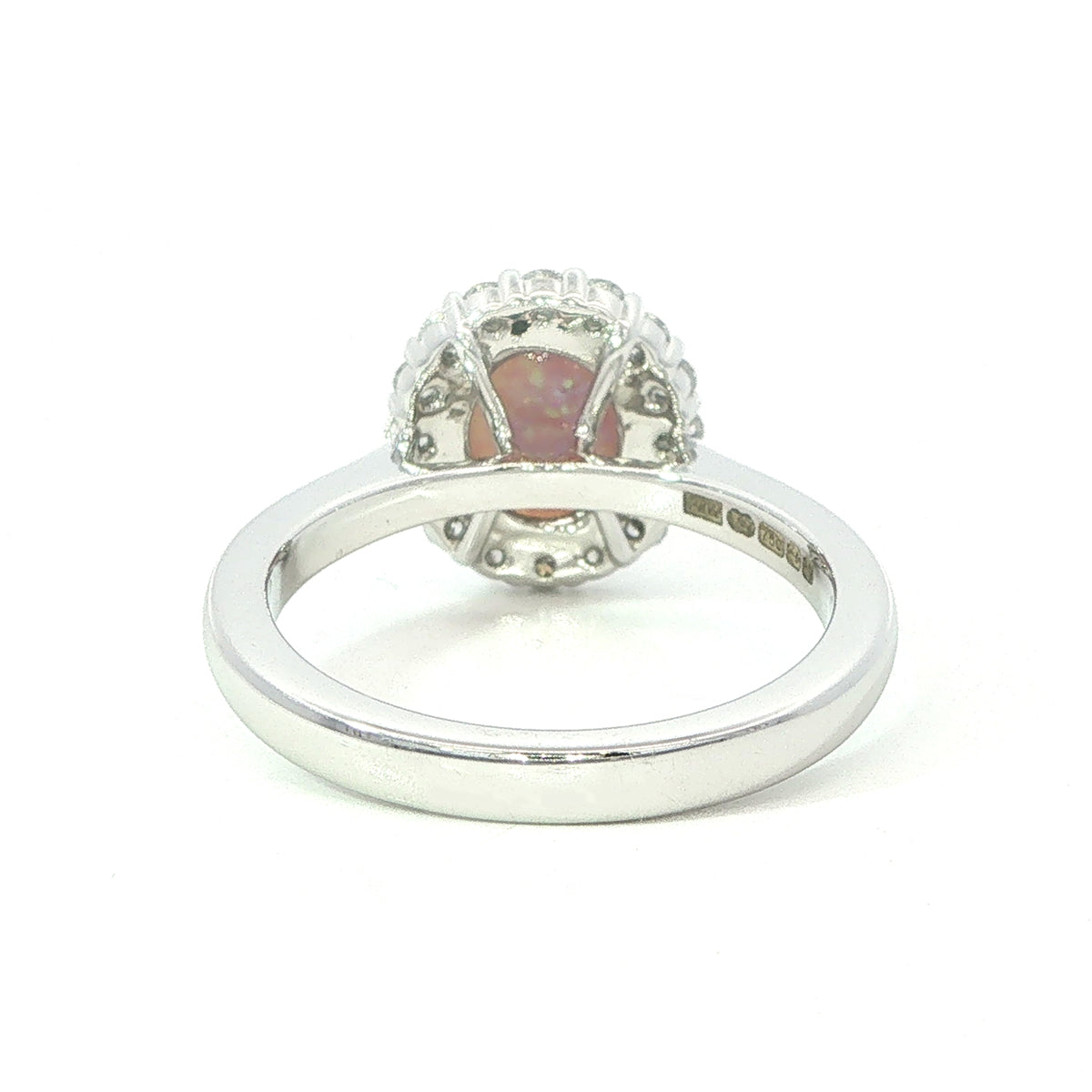 An 18 Carat White Gold Black Opal and Diamond Halo Ring