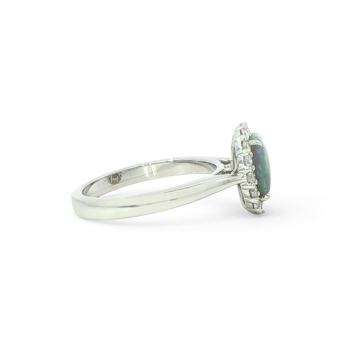 An 18 Carat White Gold Black Opal and Diamond Halo Ring