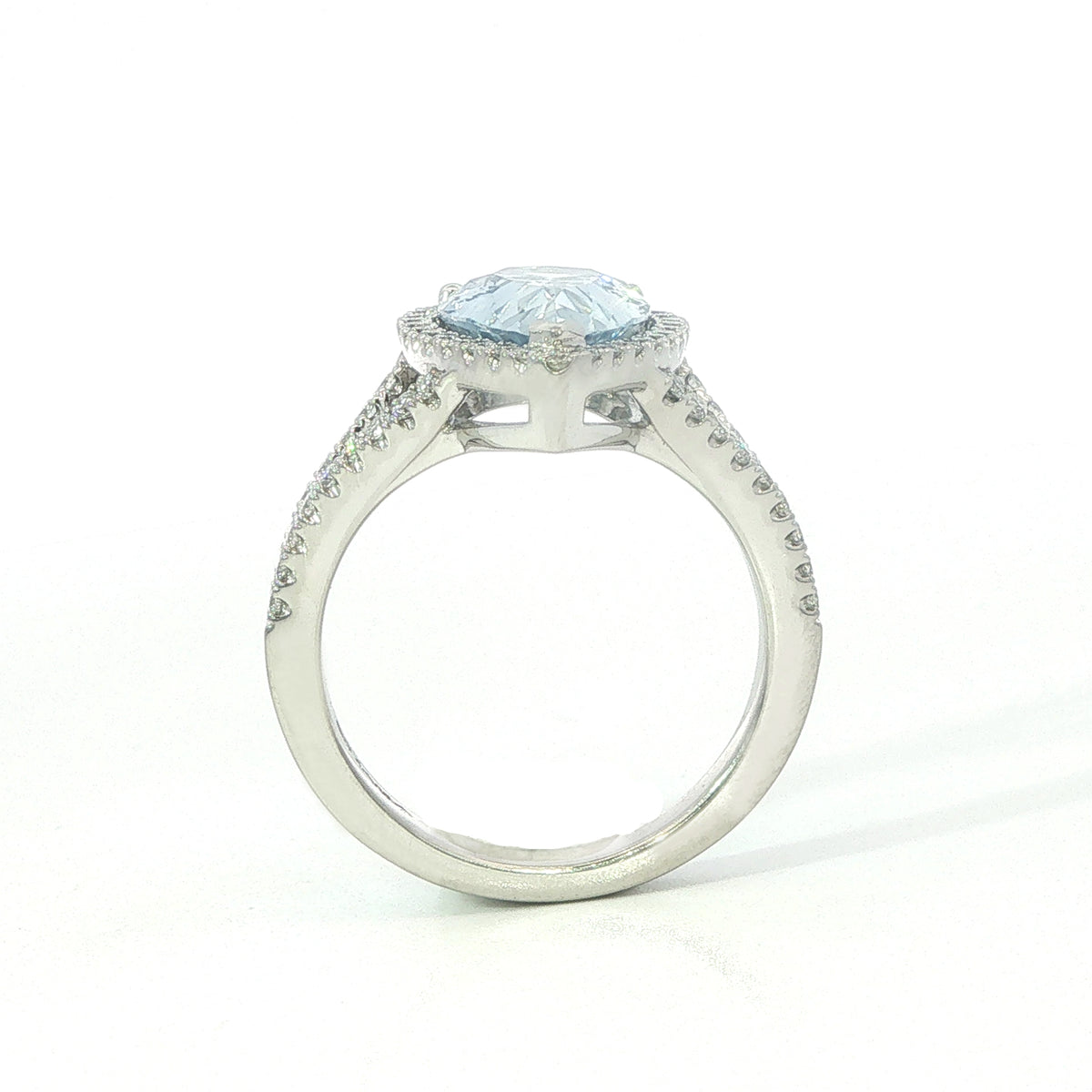 A Platinum  Sapphire and Diamond Pear Shape Ring