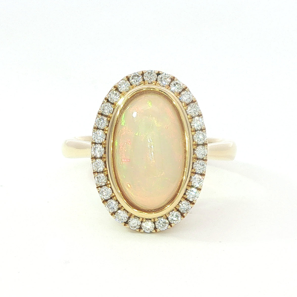An 18 Carat Yellow Gold Opal and Diamond Dress Ring