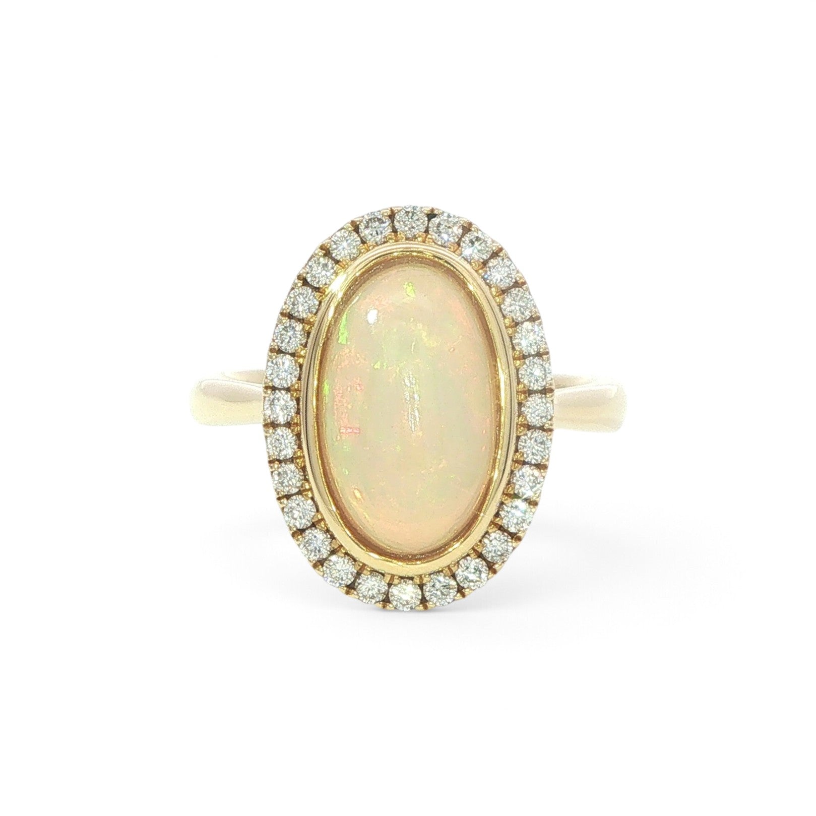 An 18 Carat Yellow Gold Opal and Diamond Dress Ring