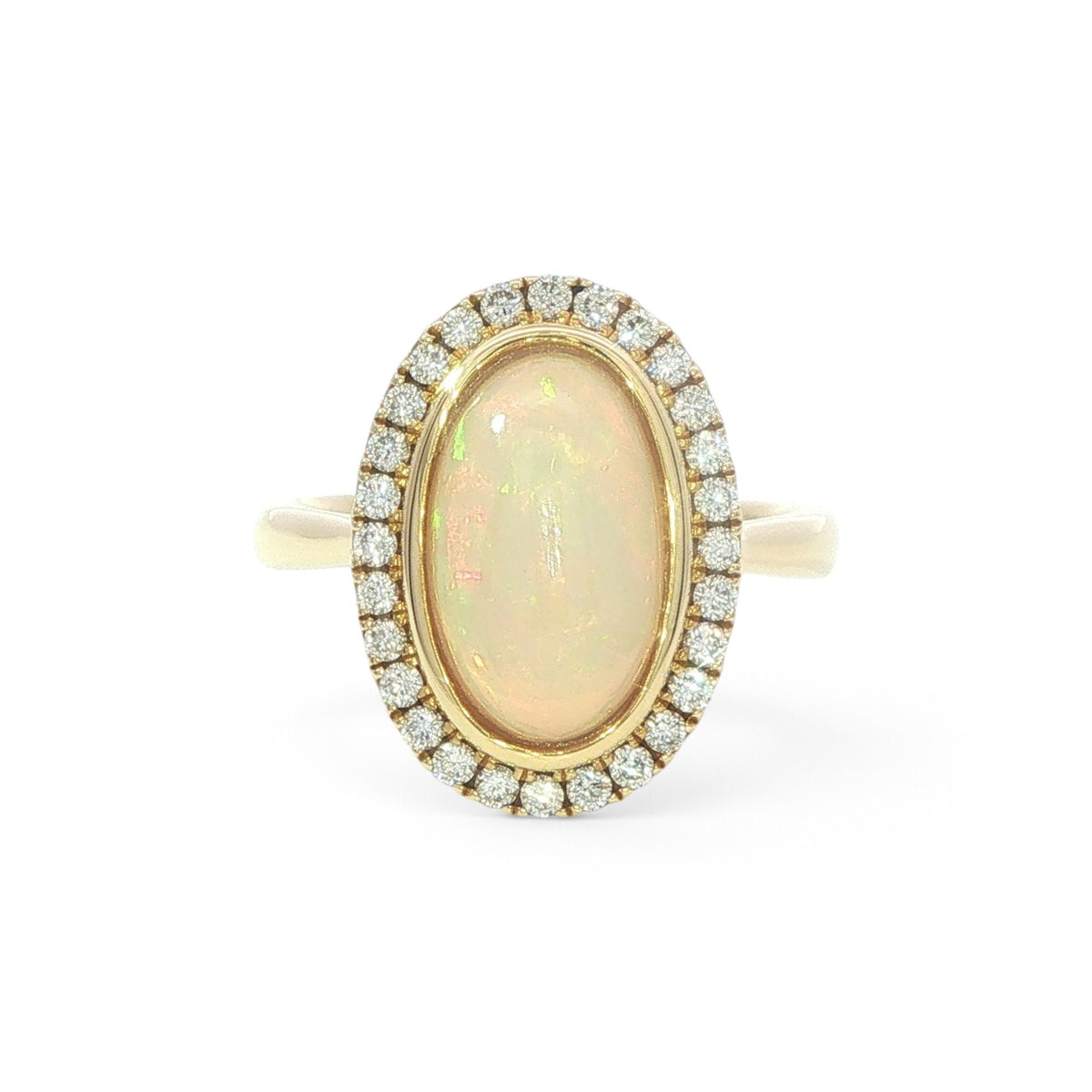 An 18 Carat Yellow Gold Opal and Diamond Dress Ring