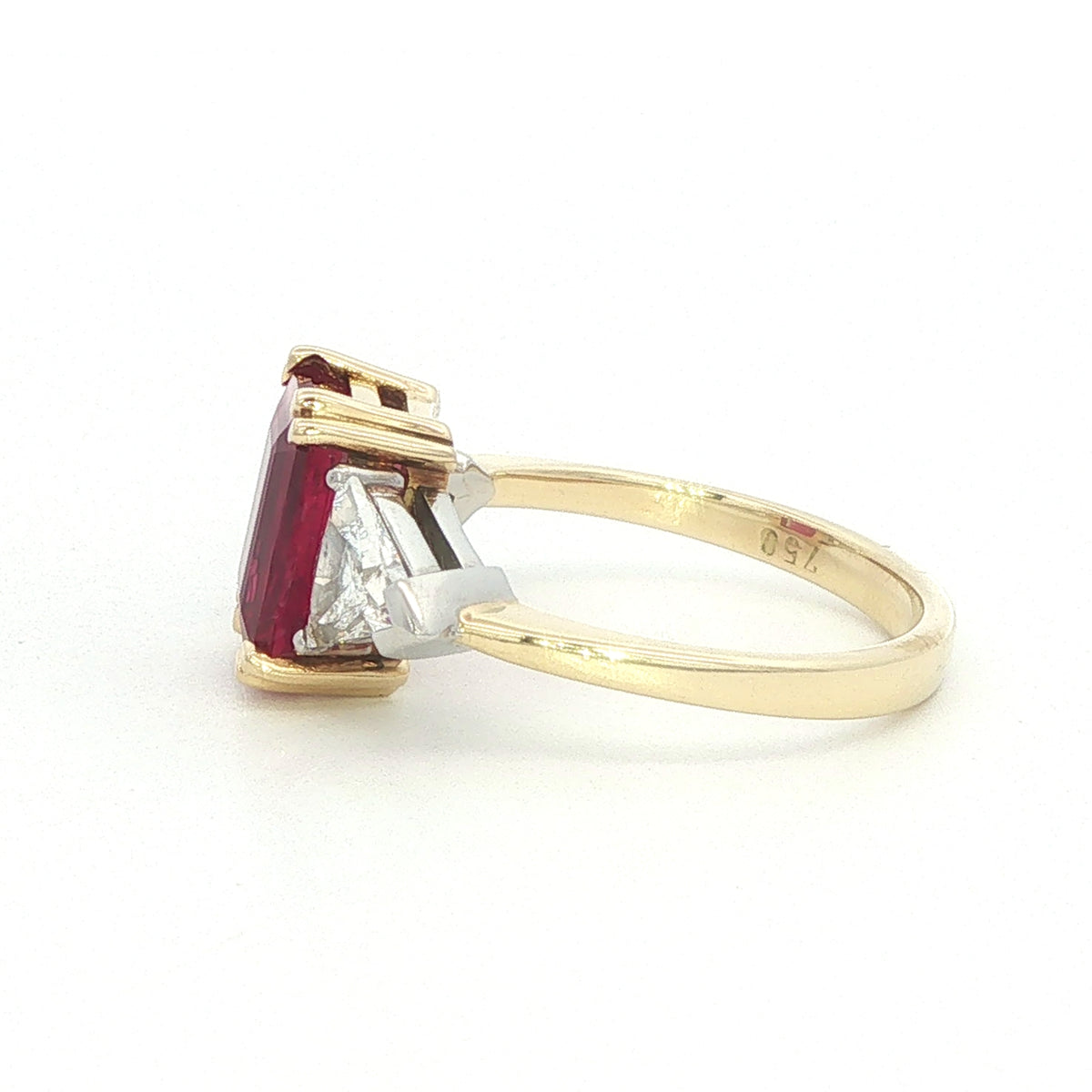 An 18 Carat Yellow and White Gold Ruby and Diamond Ring