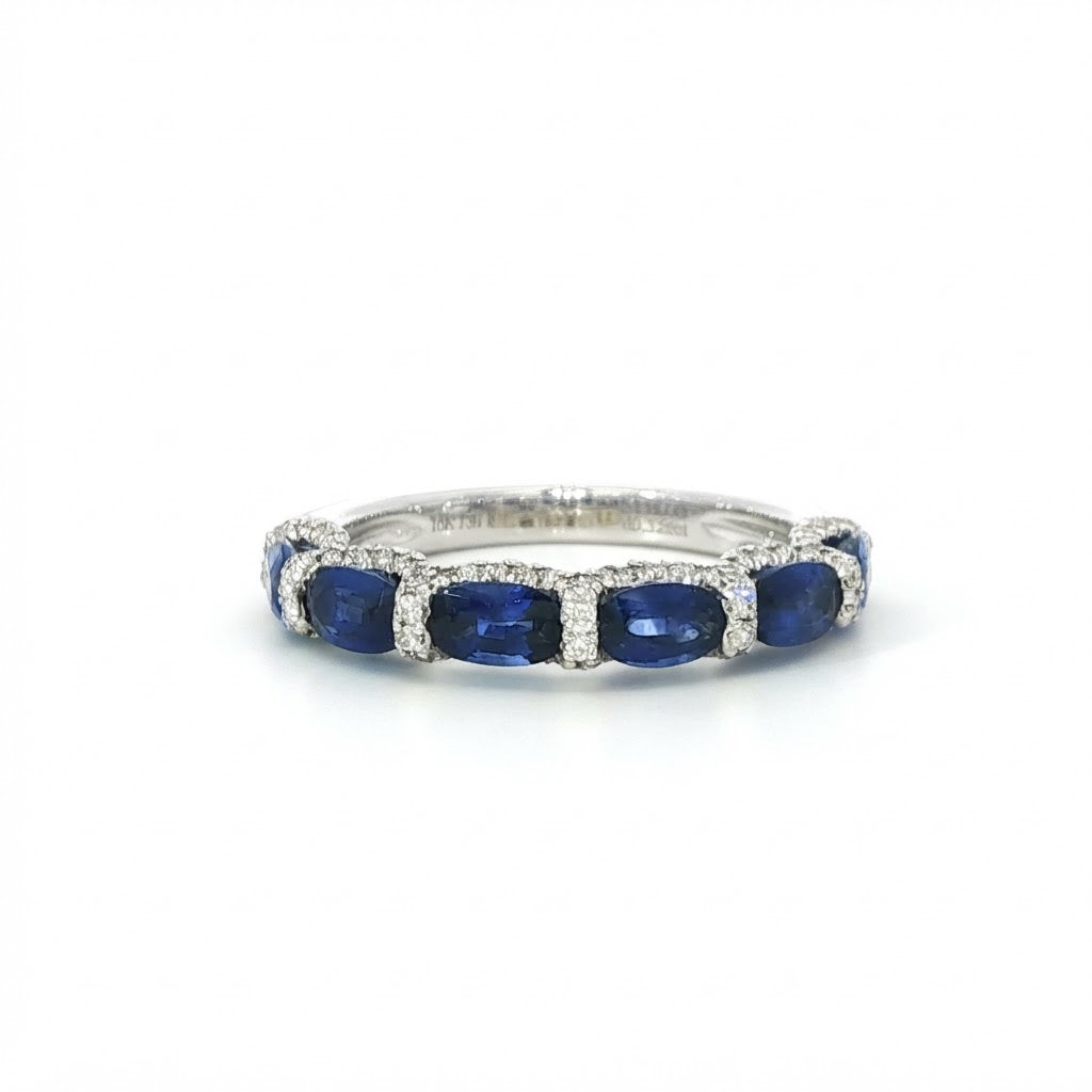 An 18 Carat White Gold Sapphire and Diamond 6 Stone Ring