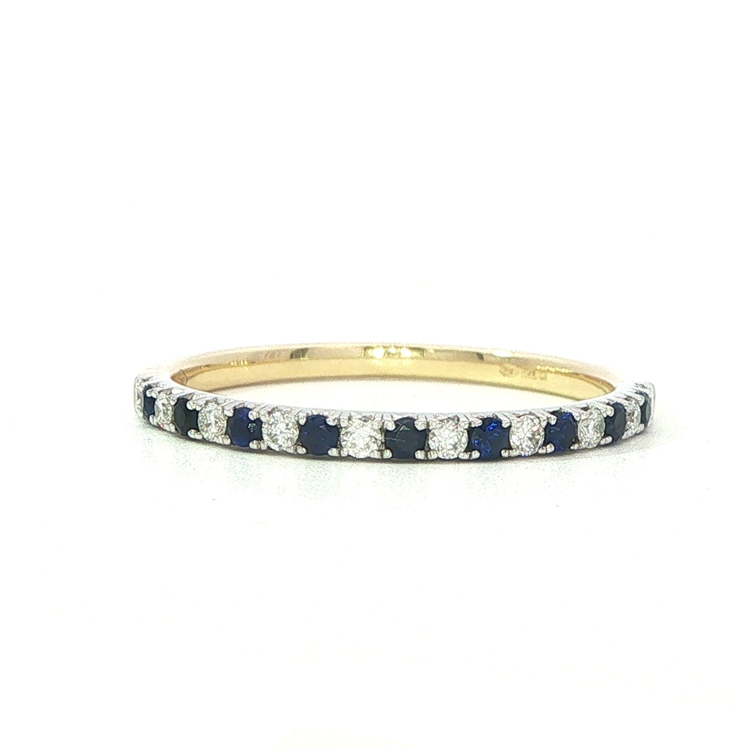 A 18 Carat Yellow and White Gold Sapphire and Diamond Half Eternity Style Ring