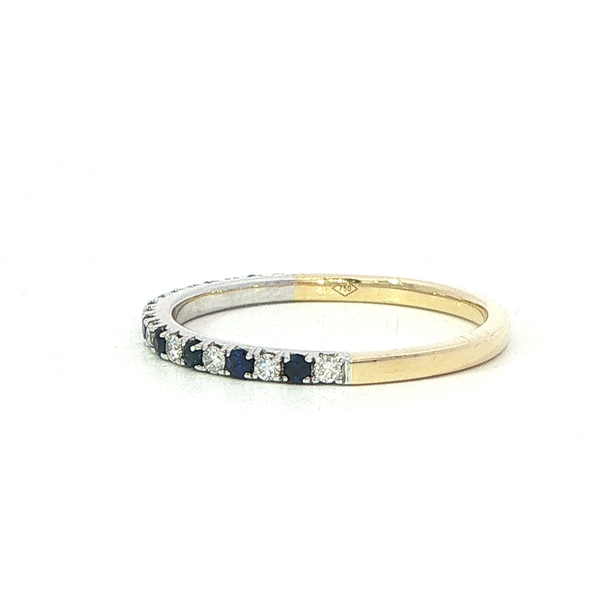 A 18 Carat Yellow and White Gold Sapphire and Diamond Half Eternity Style Ring