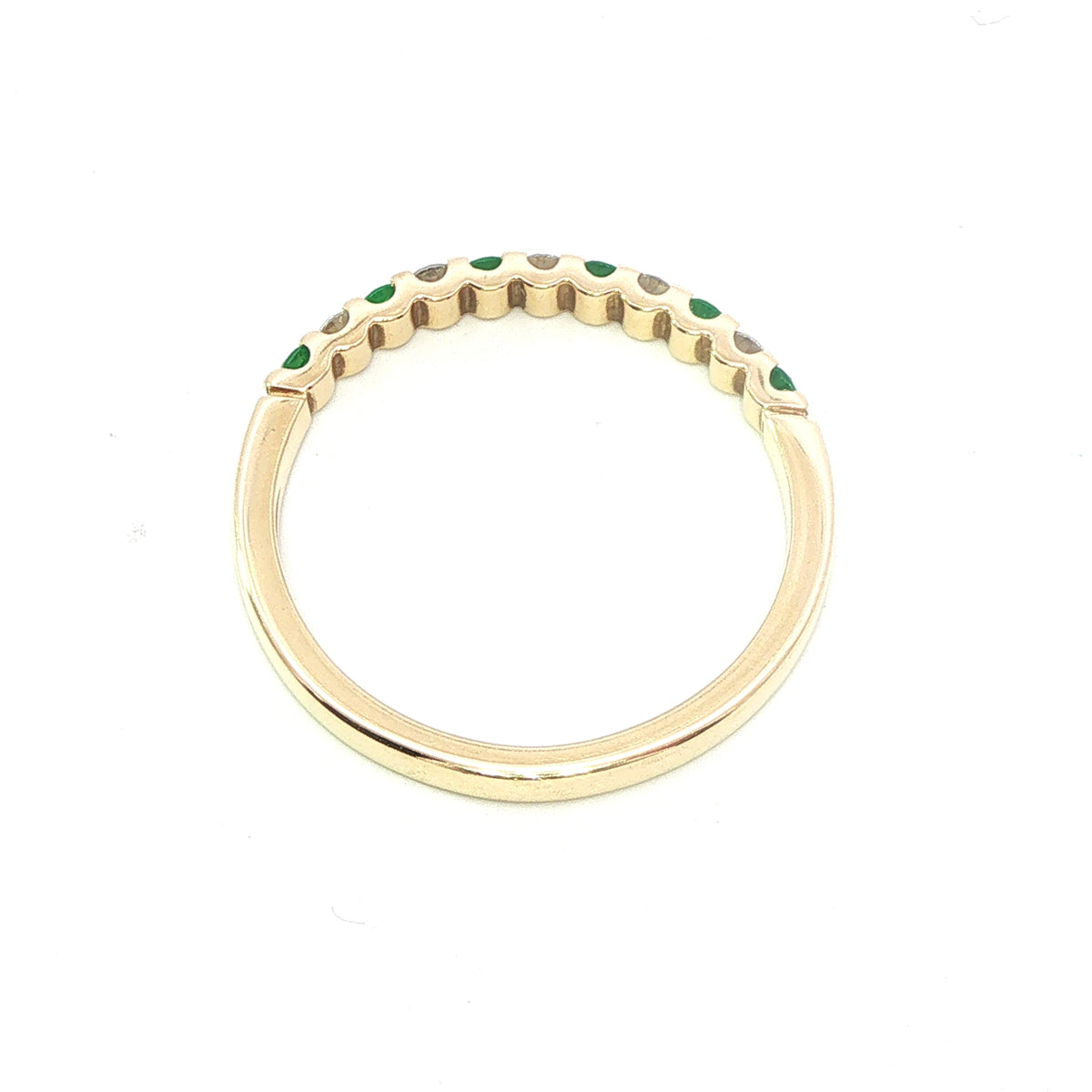 An 18 Carat Yellow Gold Emerald and Diamond Cog Set ½ Eternity Ring