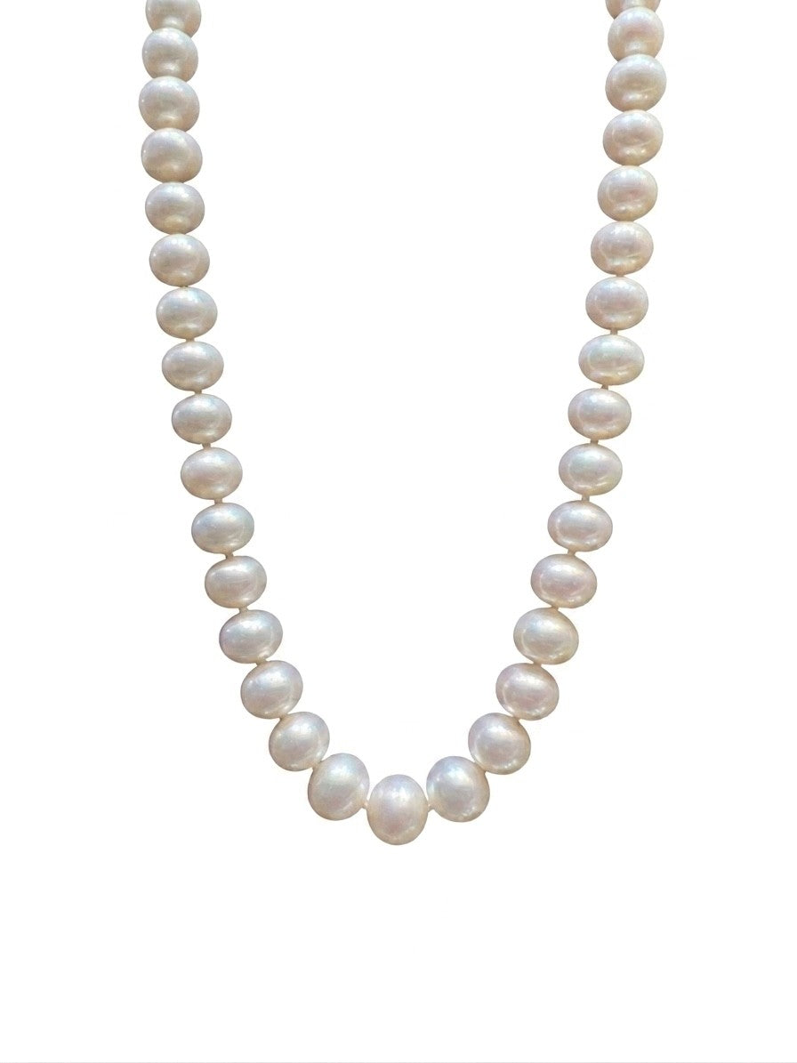 A Strand of 10mm White Fresh Water Pearls